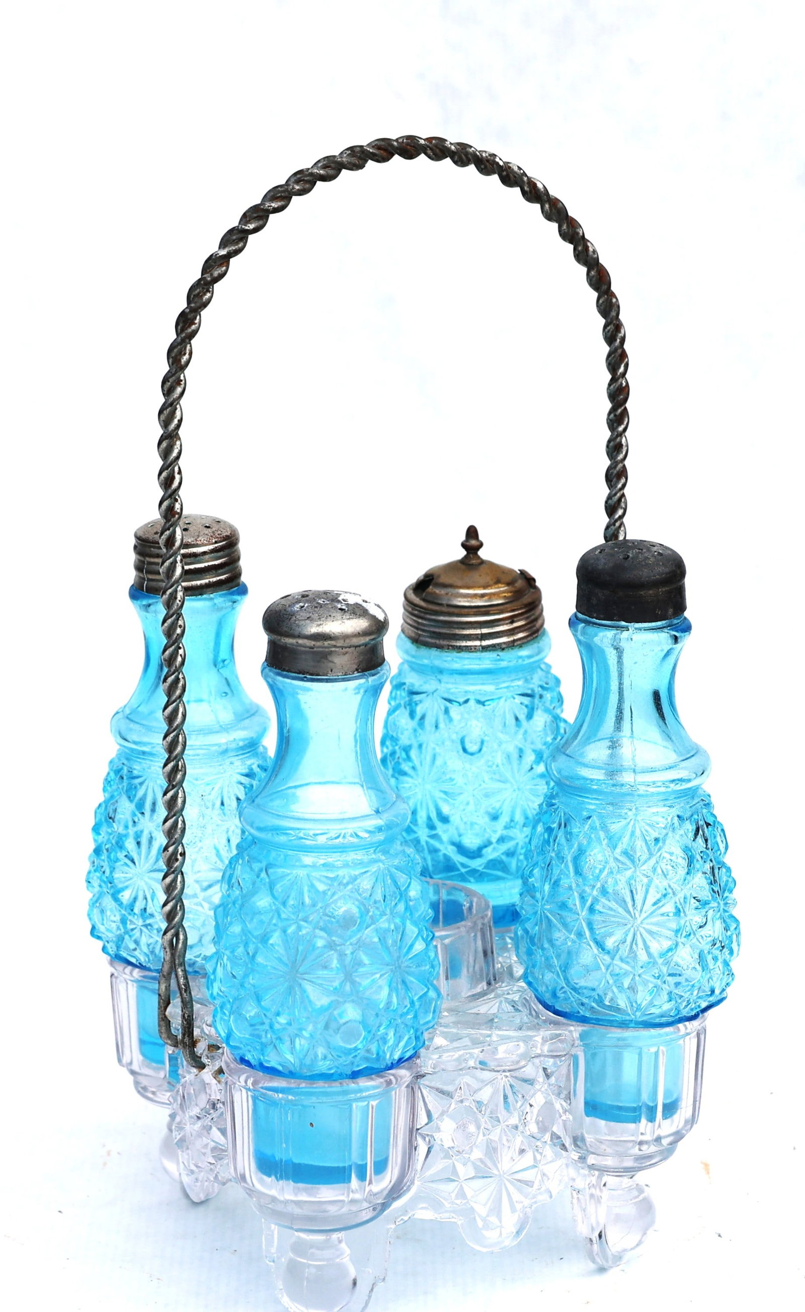 antique castor set features vibrant blue pressed glass bottles with a detailed diamond and star pat (1 of 4)