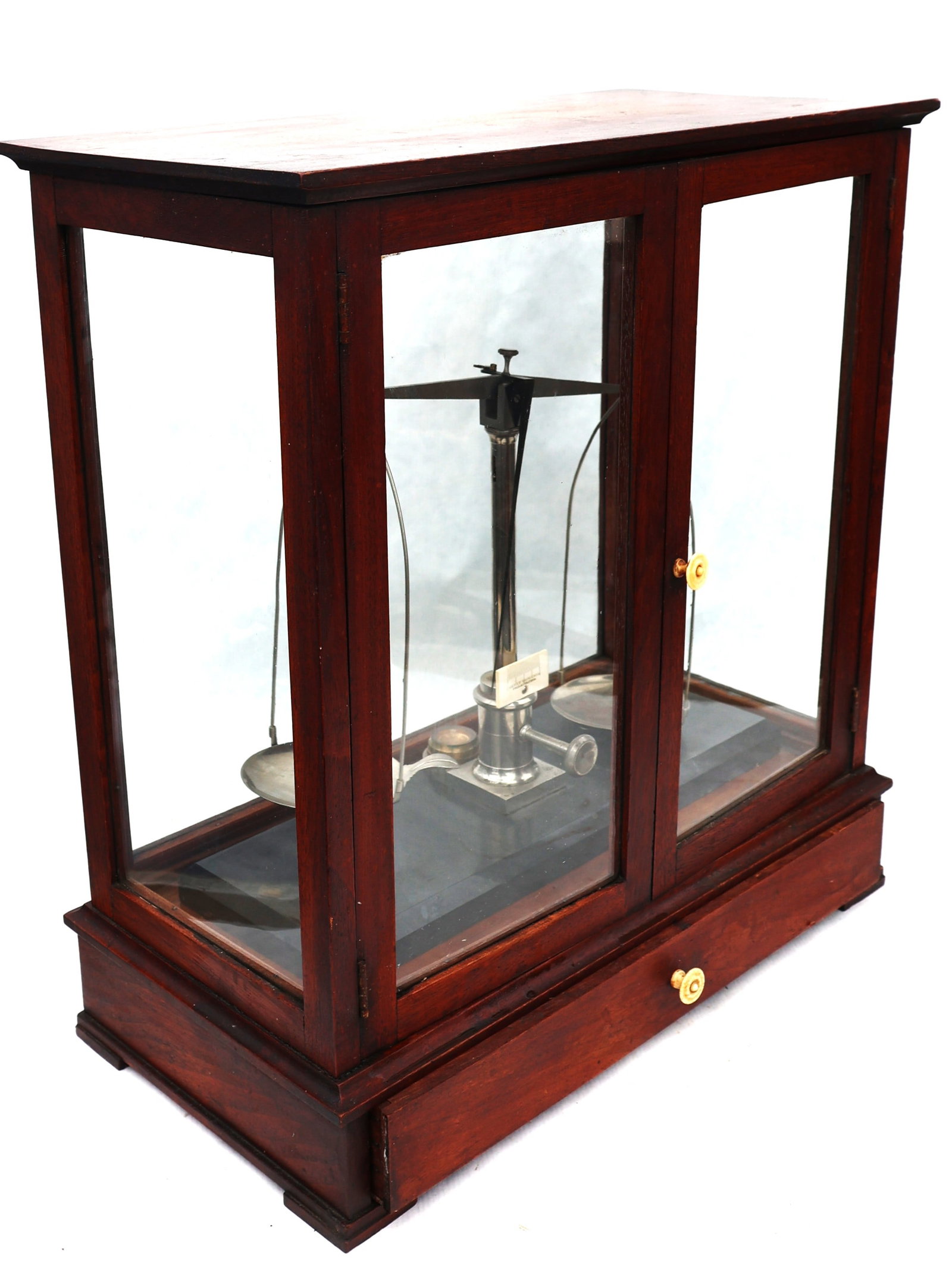antique mahogany-cased balance scale features a vertical sliding glass door and a lower storage draw - 4