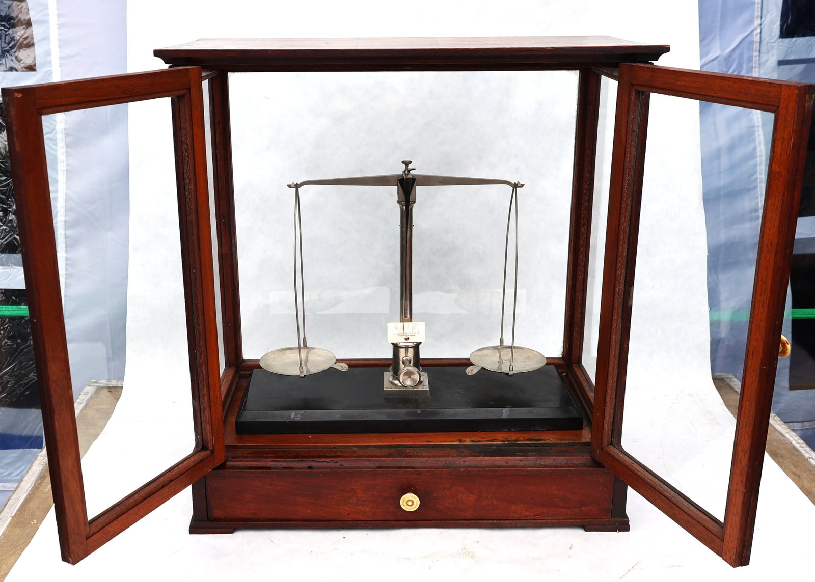 antique mahogany-cased balance scale features a vertical sliding glass door and a lower storage draw - 5