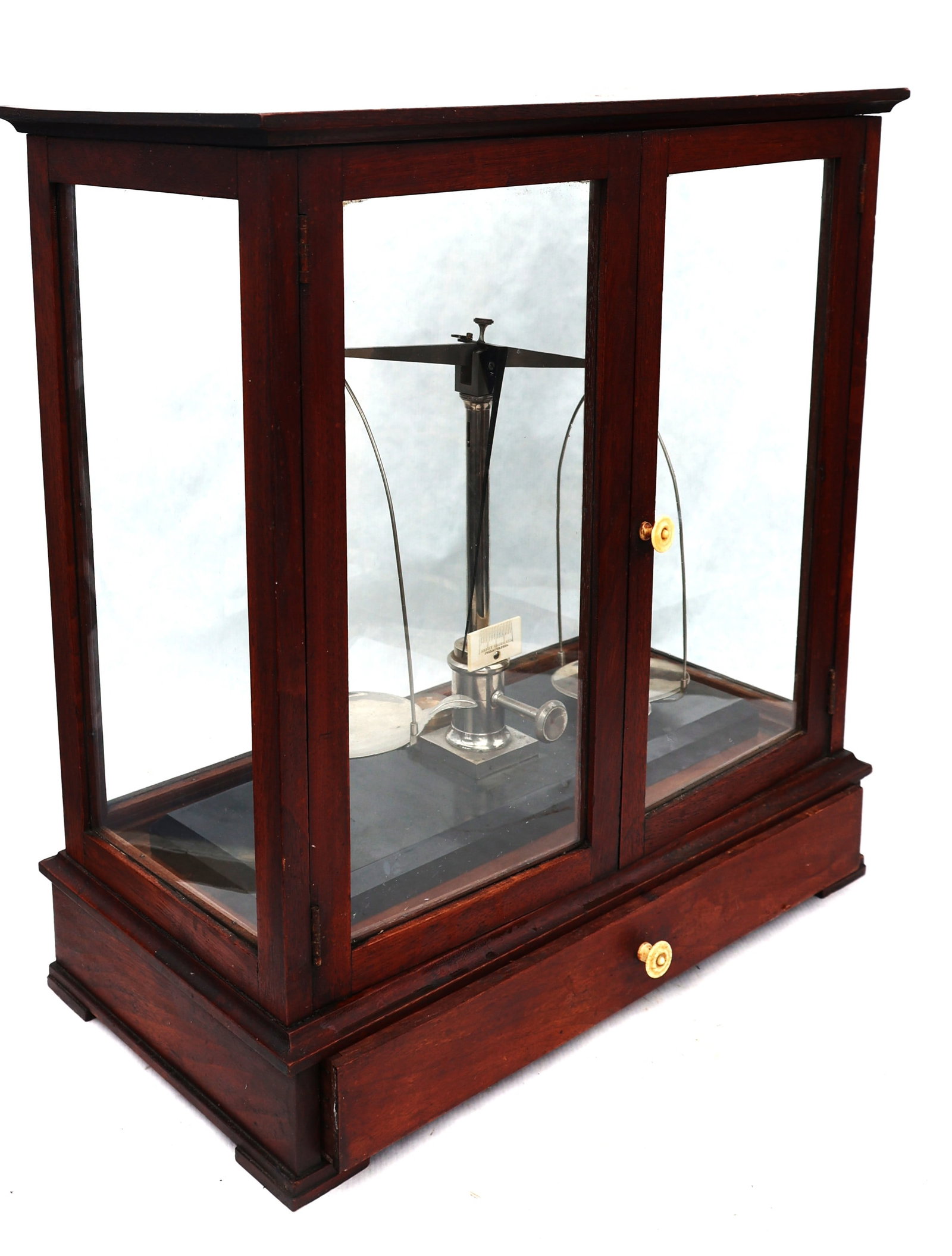 antique mahogany-cased balance scale features a vertical sliding glass door and a lower storage draw - 6