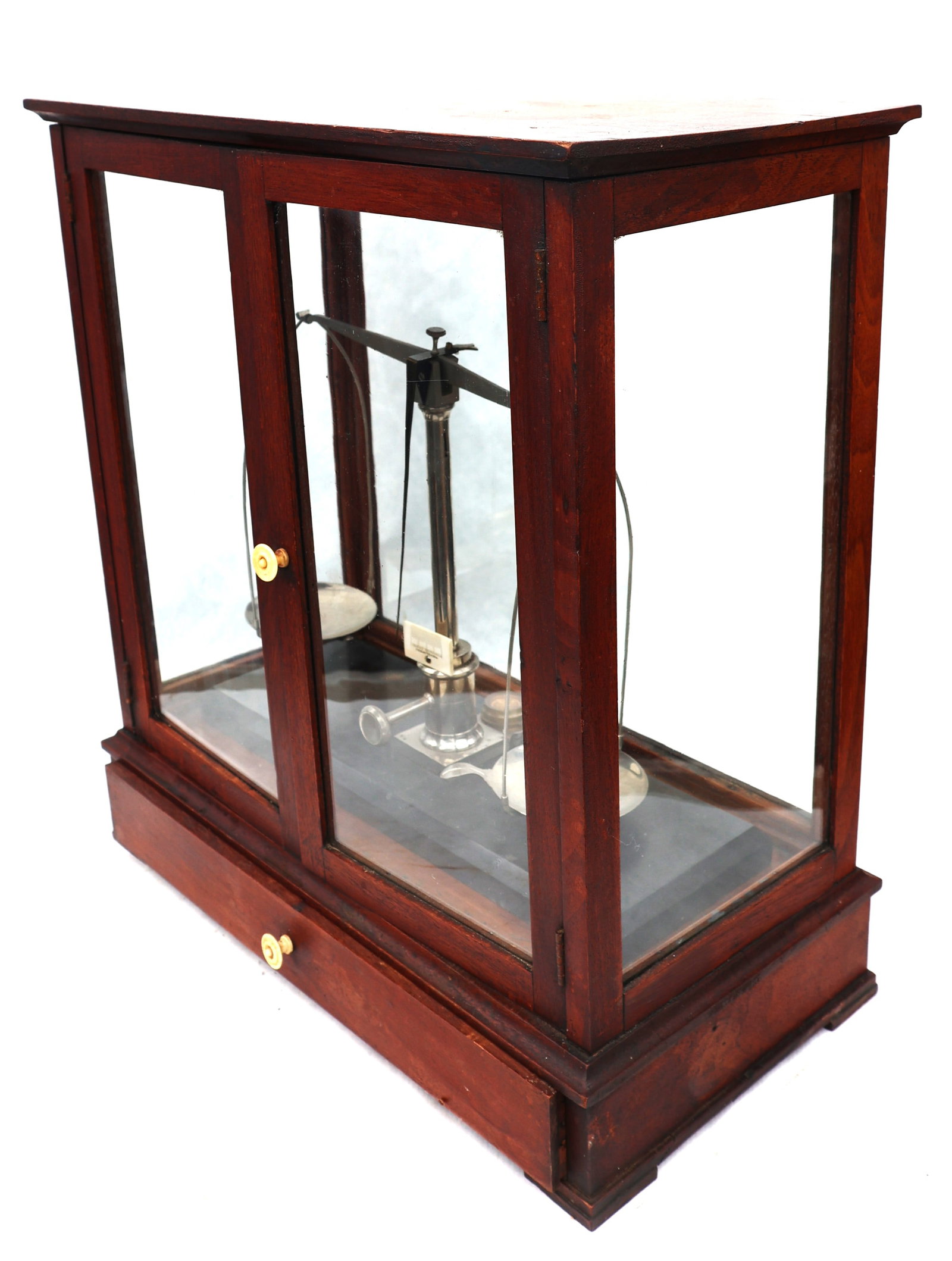 antique mahogany-cased balance scale features a vertical sliding glass door and a lower storage draw - 7