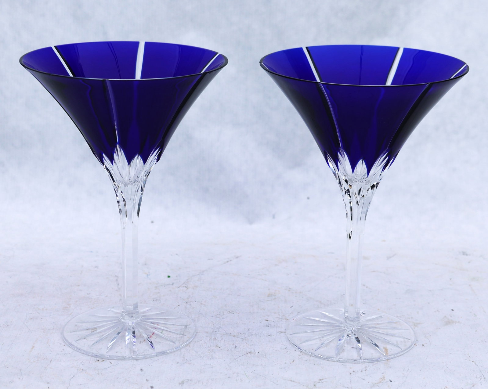 Ajka Cobalt Blue Cut to Clear martini glasses are crafted from Hungarian lead crystal: Size: 7 1/4 in. height x 5 in. wide top '; Ajka Cobalt Blue Cut to Clear martini glasses are crafted from Hungarian lead crystal