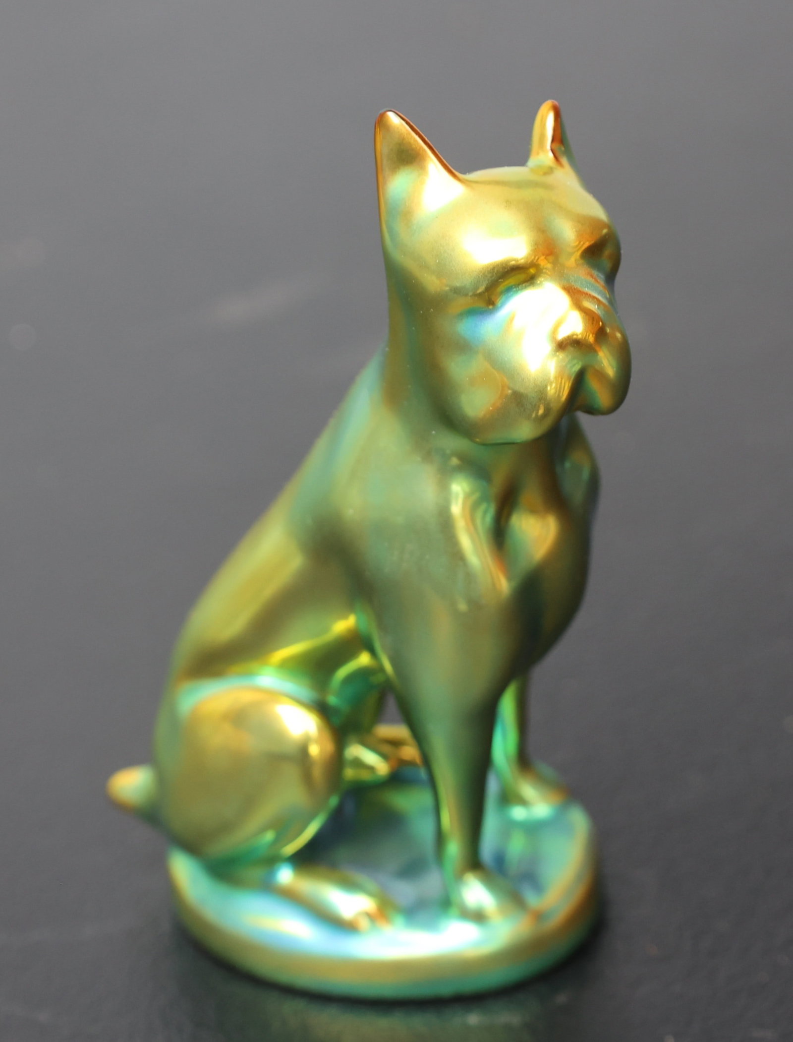 Zsolnay Green Iridescent Pottery Boxer Dog Figure: Zsolnay Green Iridescent Pottery Boxer Dog Figure. Good Condition, No Flaws. Size: 5 1/4 in. height ; base 3 in. x 2 in.