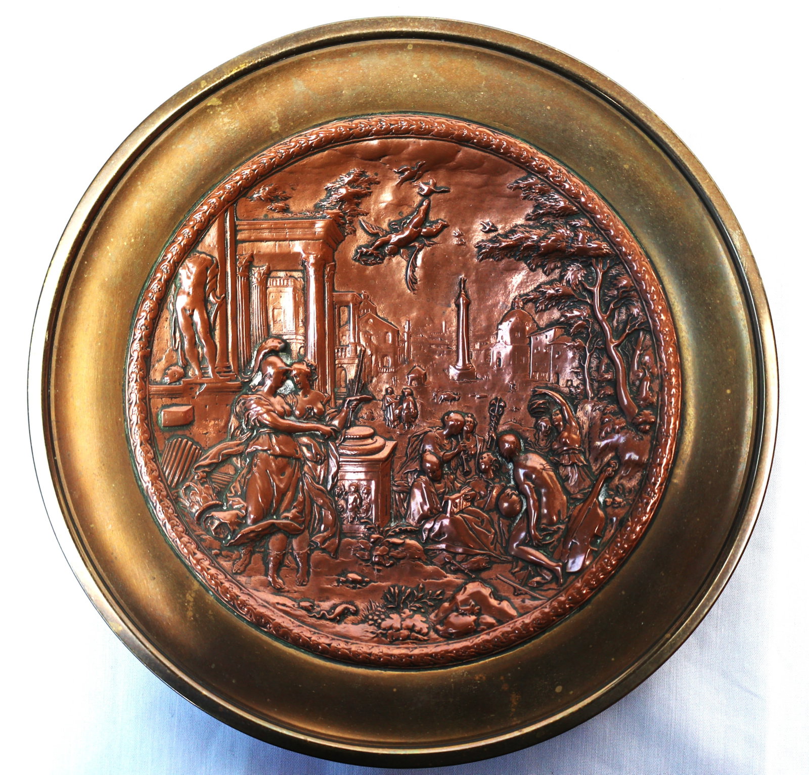 This is a decorative neoclassical wall plate or charger featuring a repoussé bronze mythological (1 of 4)