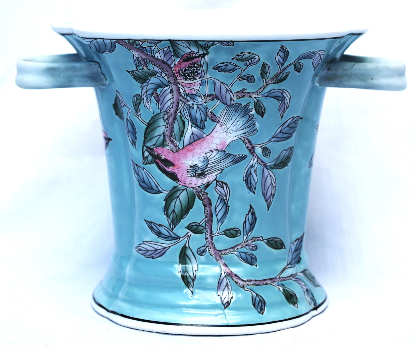 Neiman Marcus, This porcelain jardiniere features a vibrant blue-green celadon glaze with detailed h (1 of 7)