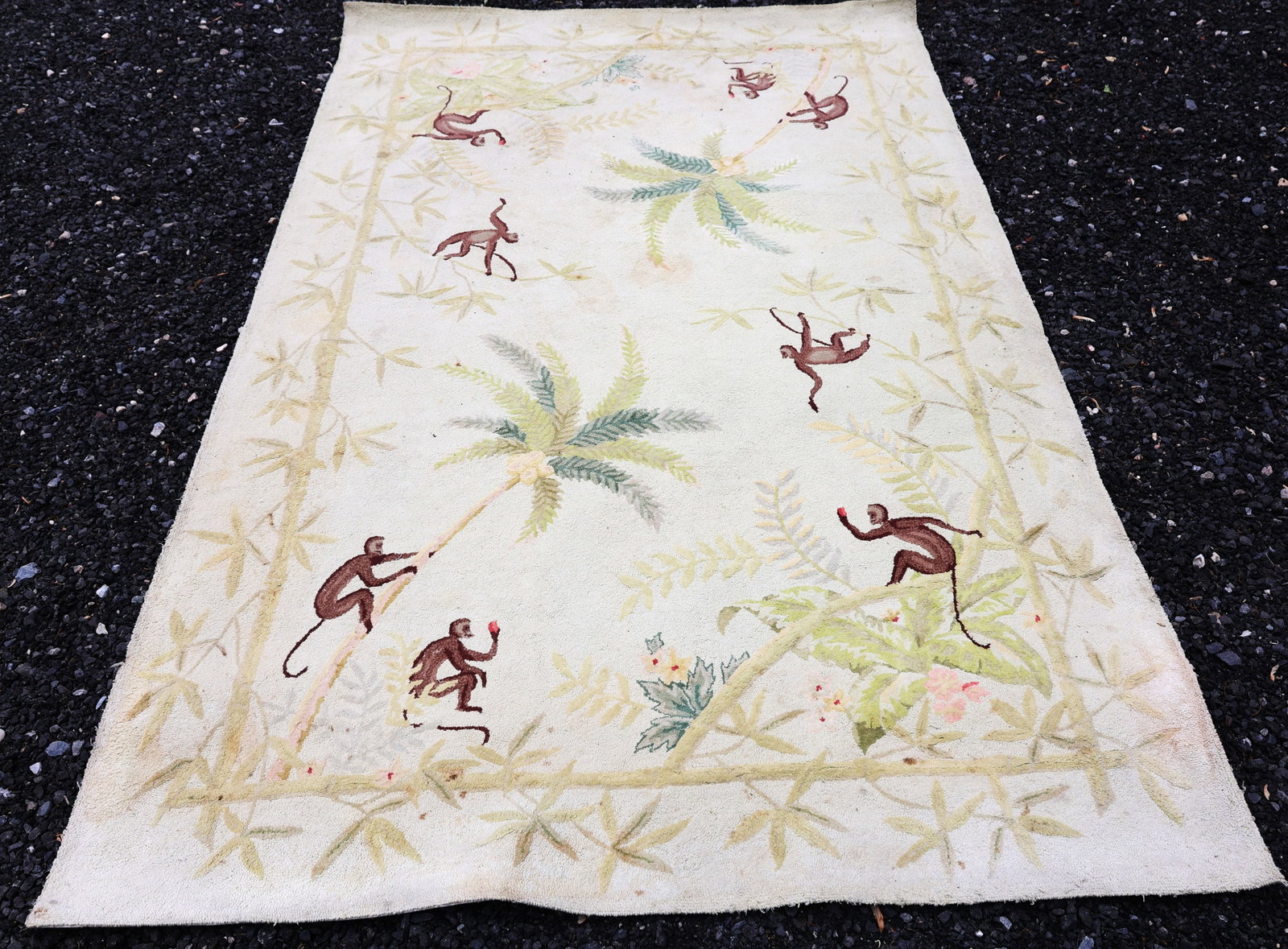 rug featuring a monkey and palm tree motif (1 of 5)