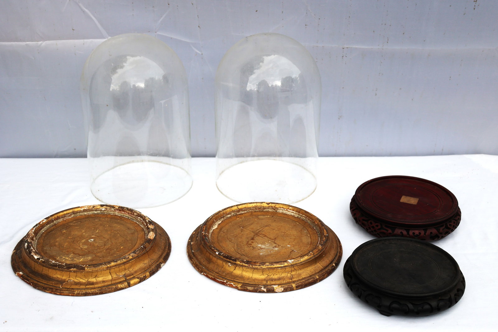 antique 19th-century French or Victorian-style glass cloche domes with odd wooden bases (1 of 4)
