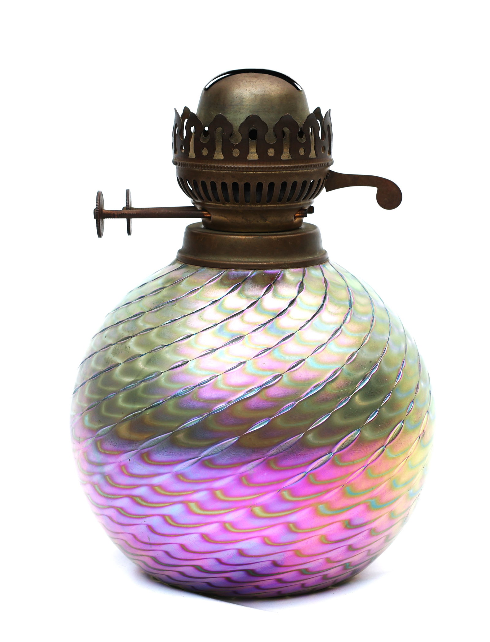 Steven Maslach iridescent studio art glass oil lamp.The lamp features a distinctive pulled feather: Size: 8 3/4 in. height, 5 1/2 in. bulbous. ; Steven Maslach iridescent studio art glass oil lamp.The lamp features a distinctive pulled feather or "peacock feather" design in the glass.
