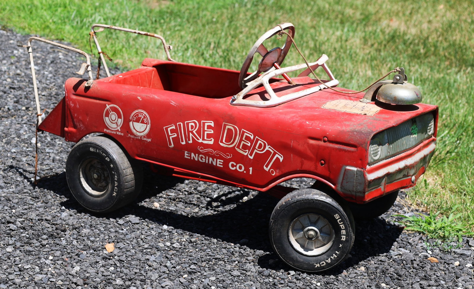 Vintage 1950's Red Fire Truck Pedal Car in Original Found Condition: Size: 18 in. height, 39 inches length, 18 in. wide. ; Vintage 1950's Red Fire Truck Pedal Car in Original Found Condition