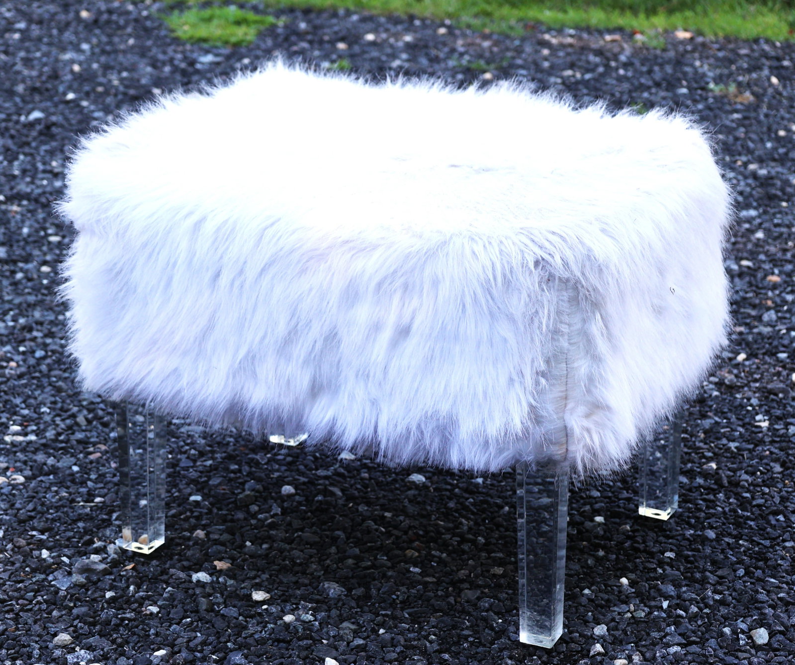 Chic Home Ricco ottoman features white faux fur upholstery supported by sturdy, clear acrylic legs (1 of 3)