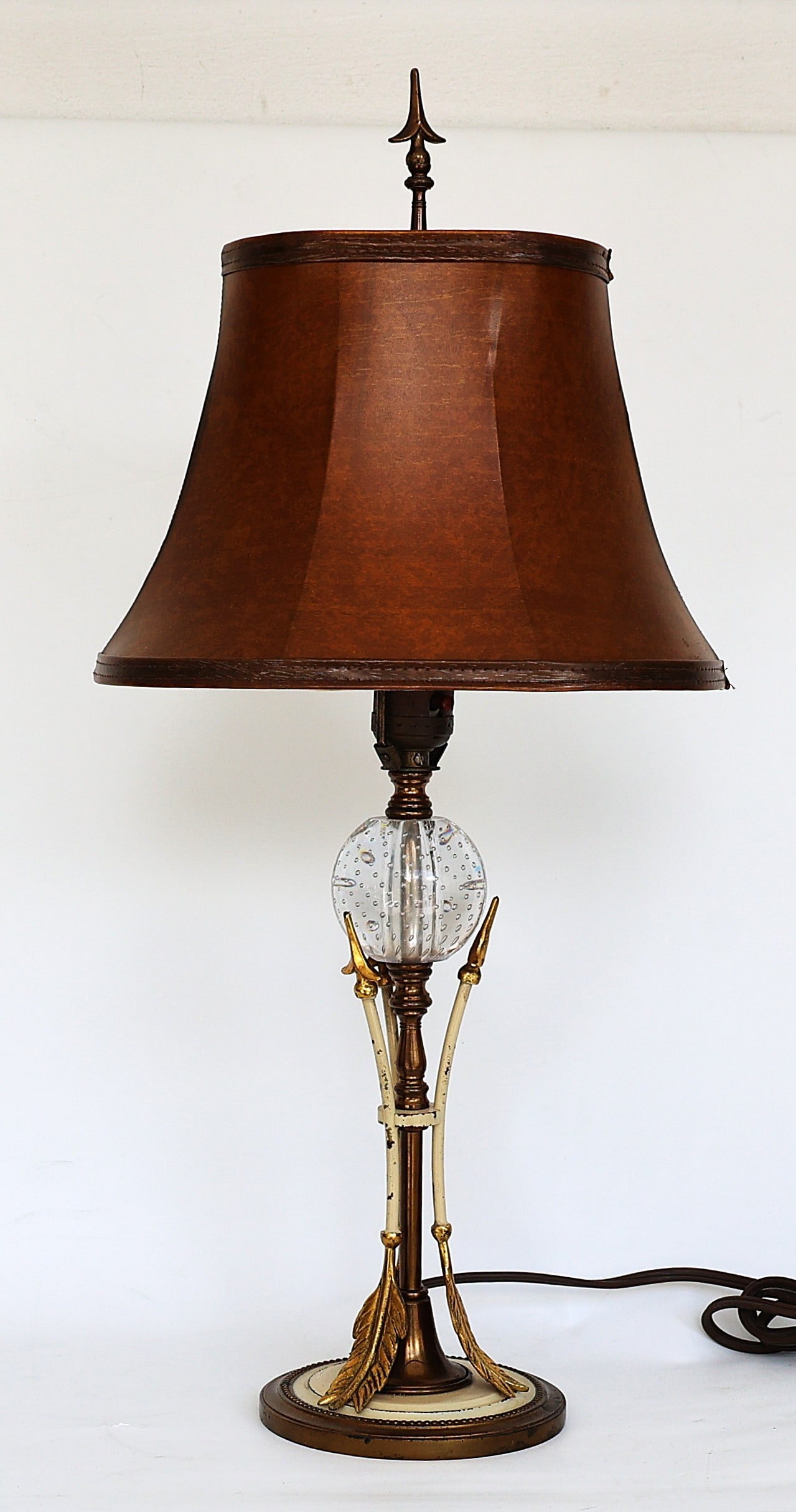 Vintage table lamp features a distinctive bubble-filled glass orb set atop an arrow-themed base.: Size: 19 1/2 in. height/ 10 in. wide shade, 5 in. base ; Vintage table lamp features a distinctive bubble-filled glass orb set atop an arrow-themed base.