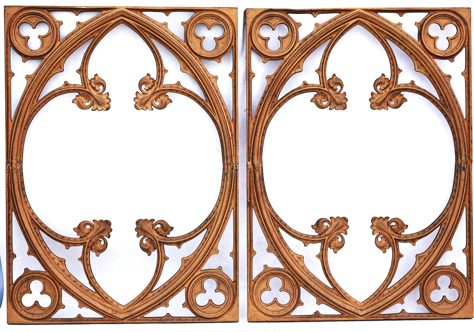 Two Bronze Gothic revival architecture, specifically echoing the design of rose windows and trefoil (1 of 5)
