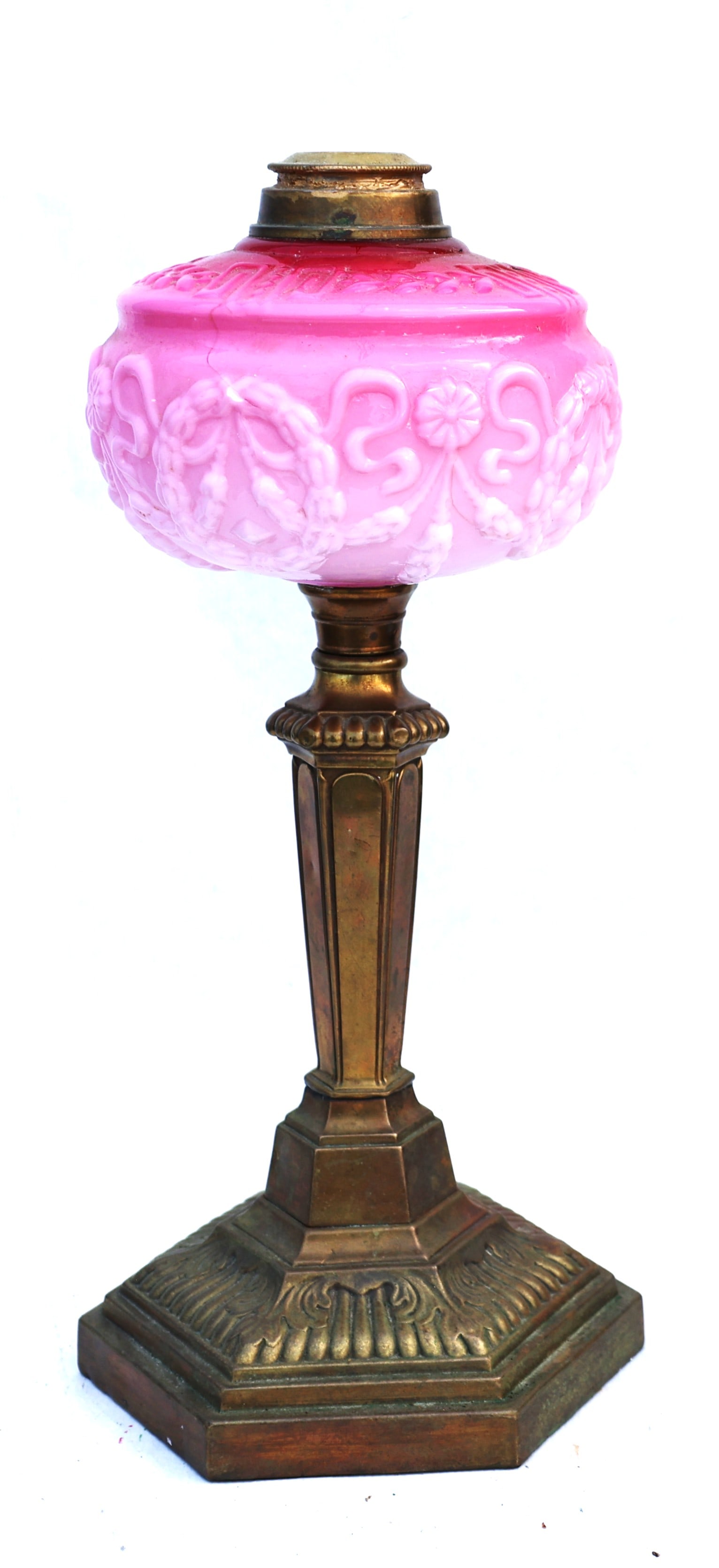 This is a Victorian-era parlor lamp featuring an embossed pink cranberry glass font and a brass base (1 of 7)