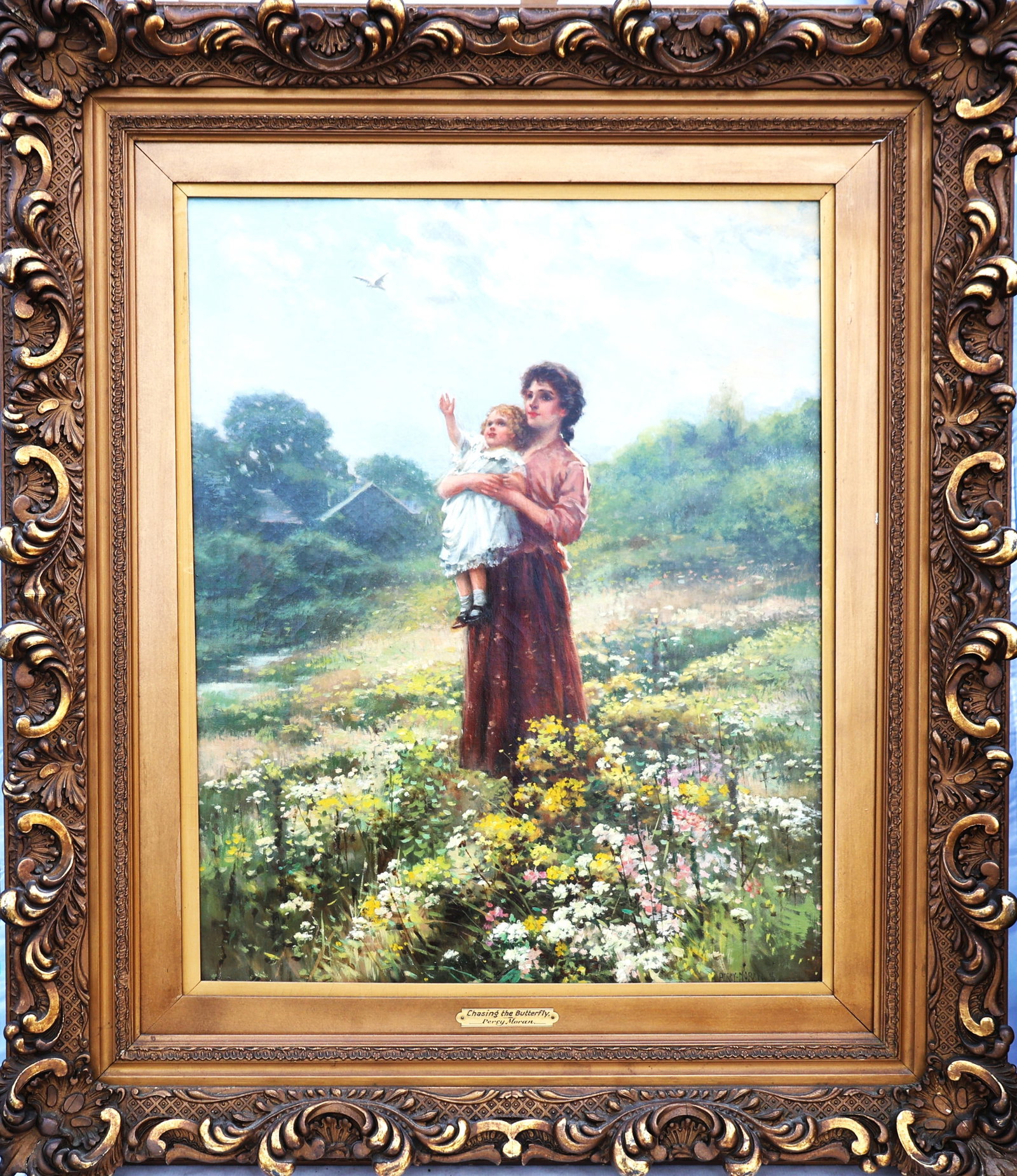 Percy Moran, American 1862-1935"Chasing The But, terfly" Oil on Canvas: Size: image 28.5 in. x 22.5 in. ; outer frame 39 in. x 34 in.; Percy (Edward Percy) MoranName variantsEdward Percy MoranBiography from the Archives of askARTPercy (Edward Percy) Moran biographical pho