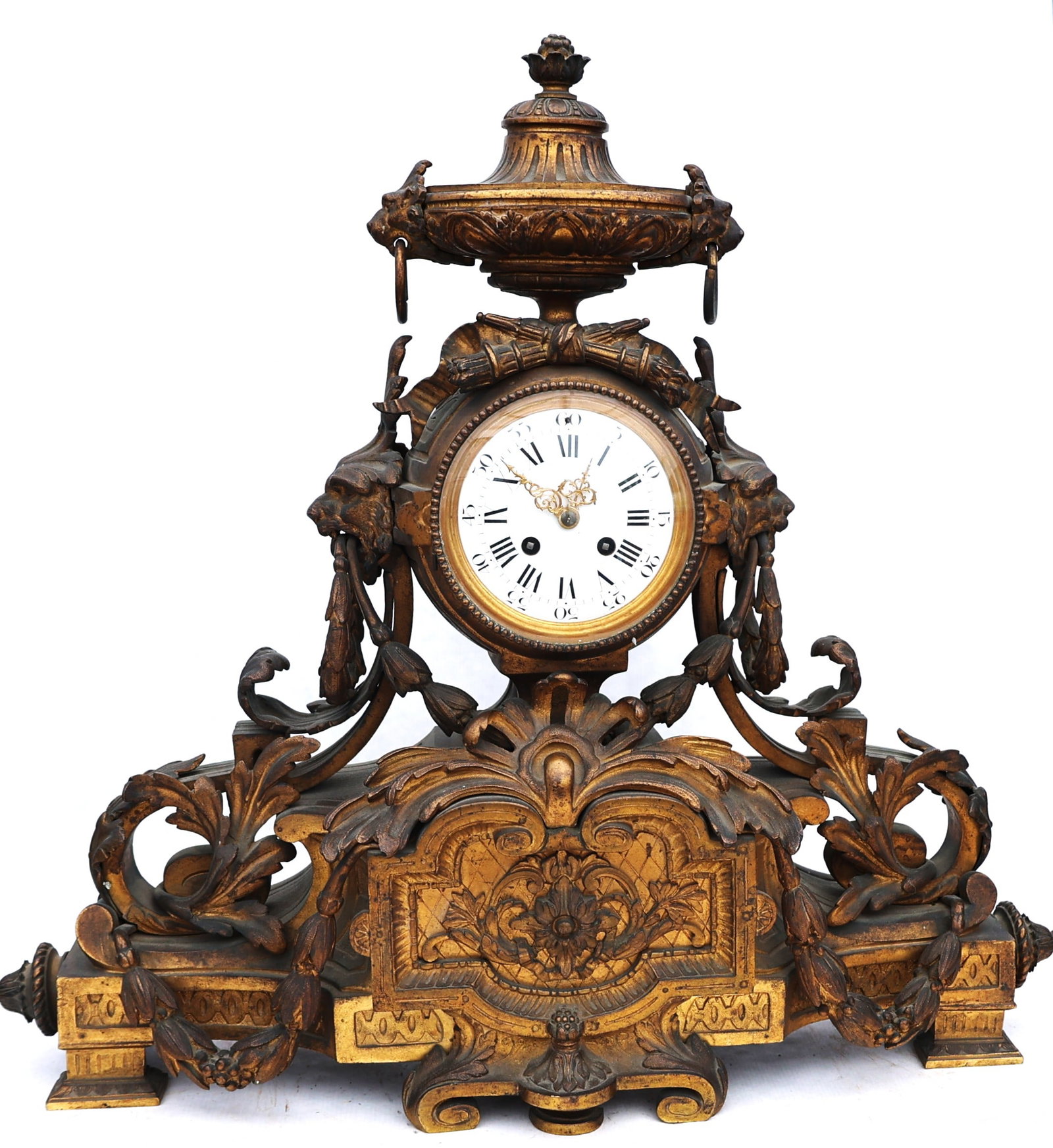 Louis XVI style gilt bronze mantel clock, likely dating from the late 19th or early 20th century.The (1 of 8)