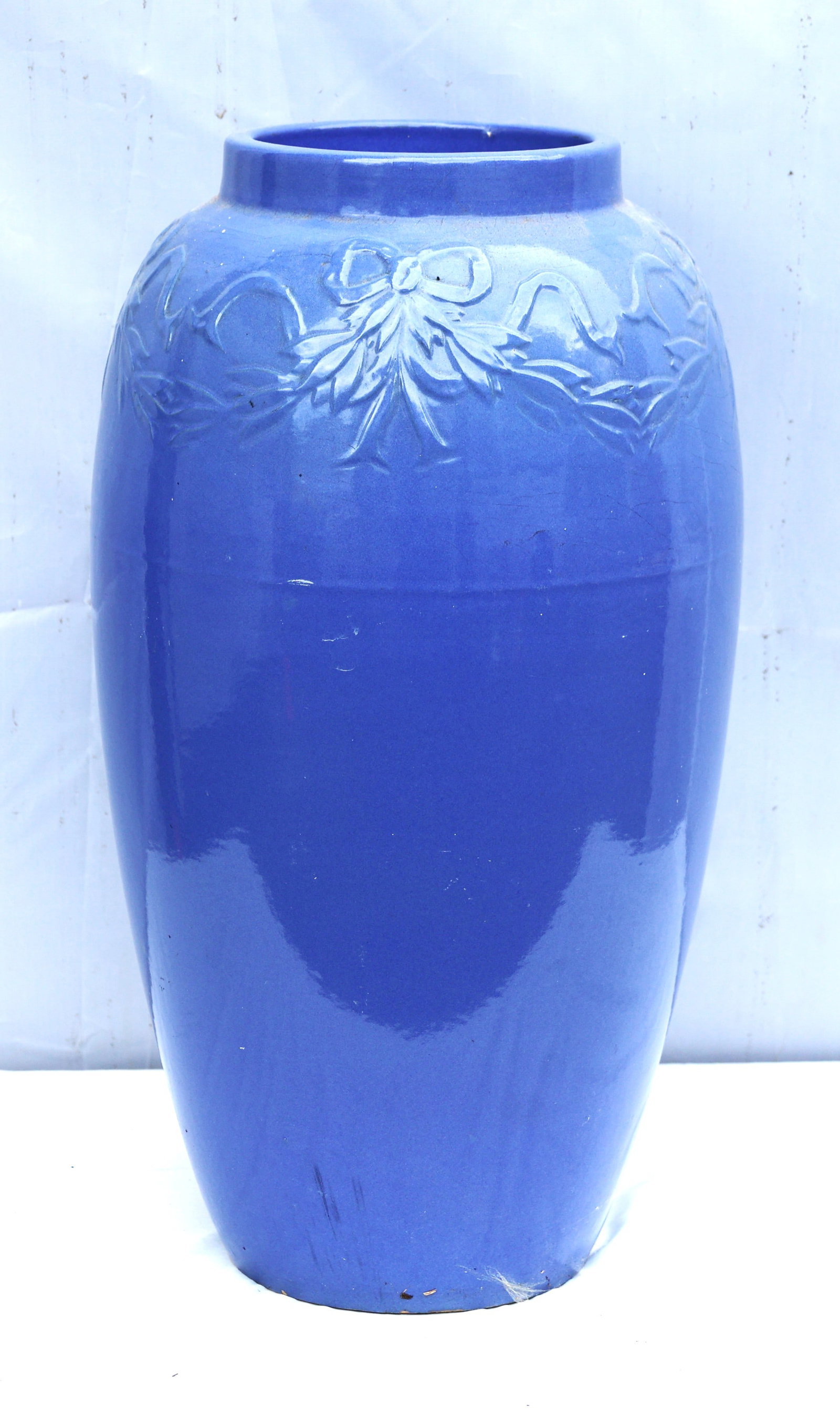 blue American art pottery floor vase from the 1930s-1940s is decorated with a relief bow and garland (1 of 4)