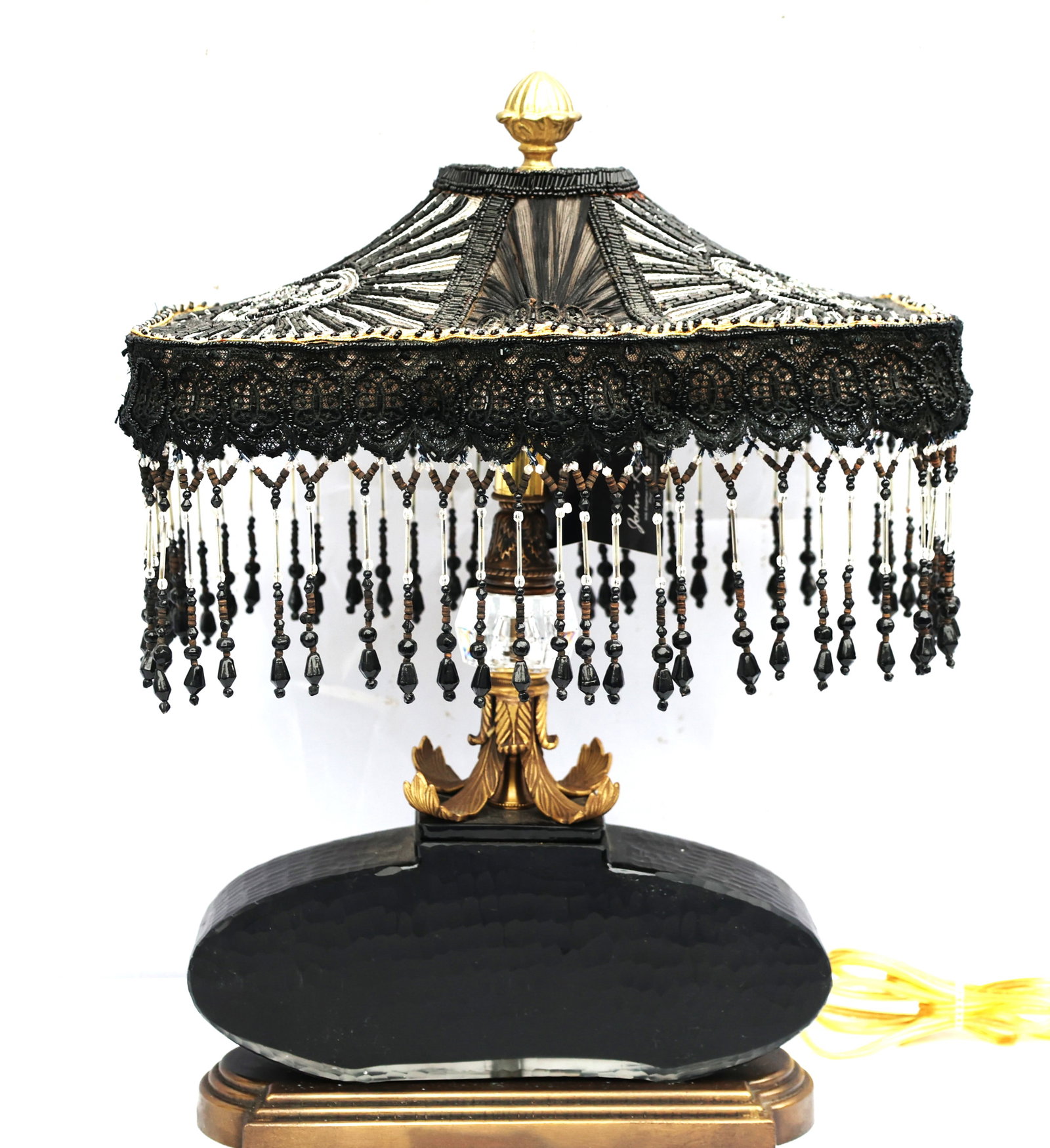 John Richards table lamp features a distinctive black chisel-cut glass base and a highly ornate embr: Size: 19 in. height , 14 in. x 11 in. shade ; John Richards table lamp features a distinctive black chisel-cut glass base and a highly ornate embroidered shade adorned with dangling beads.