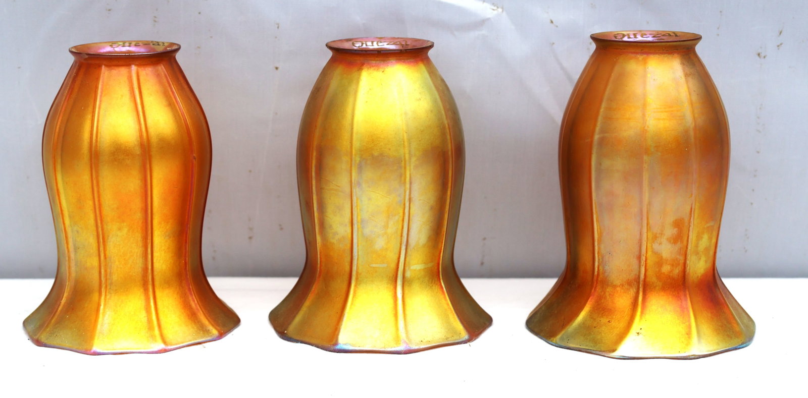 Set 3 antique Quezal art glass lamp shades featuring a gold iridescent finish and a distinctive ribb (1 of 7)