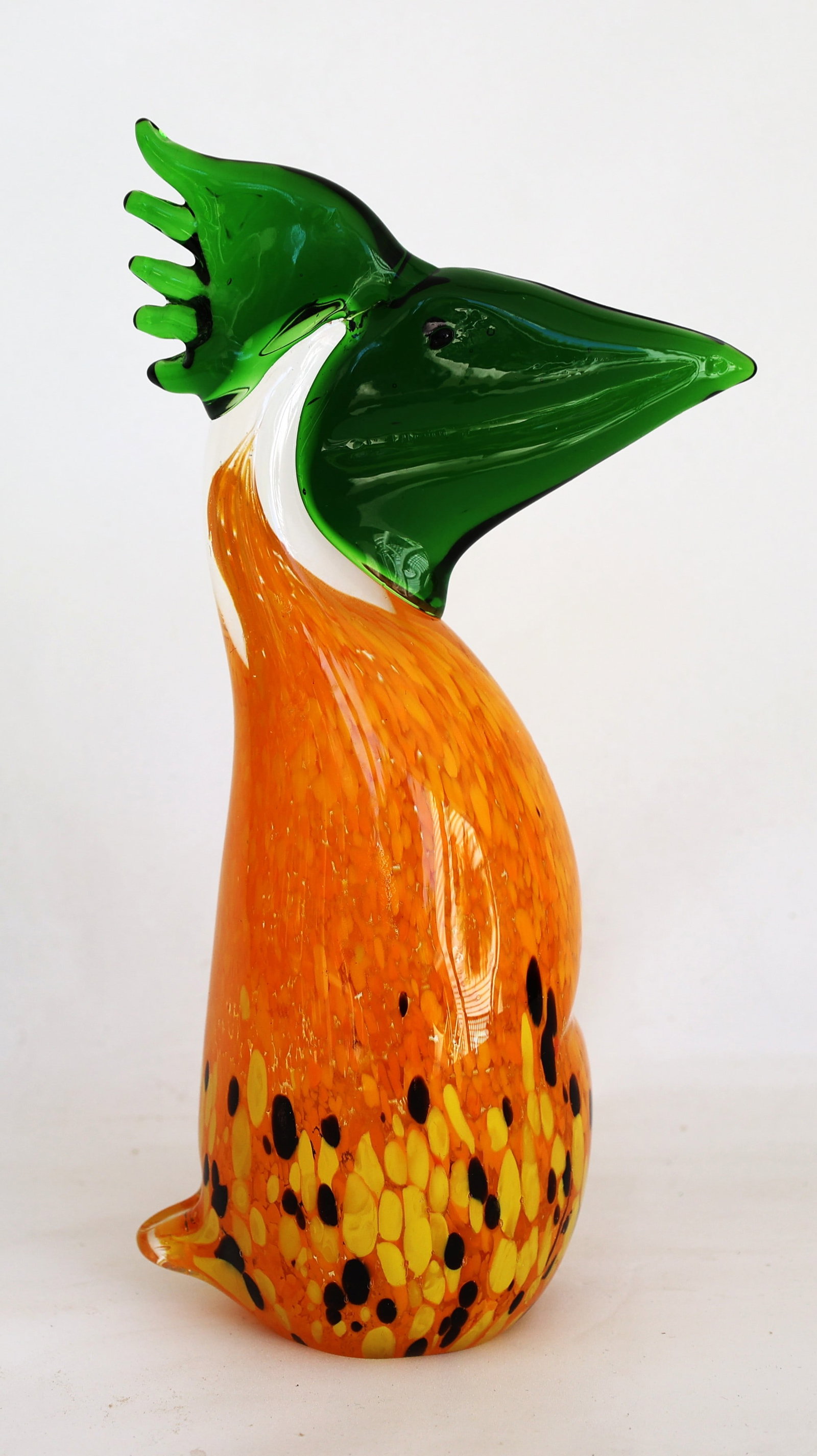 1970s Fifth Avenue Crystal toucan paperweight features a vibrant orange and yellow mottled body with (1 of 5)