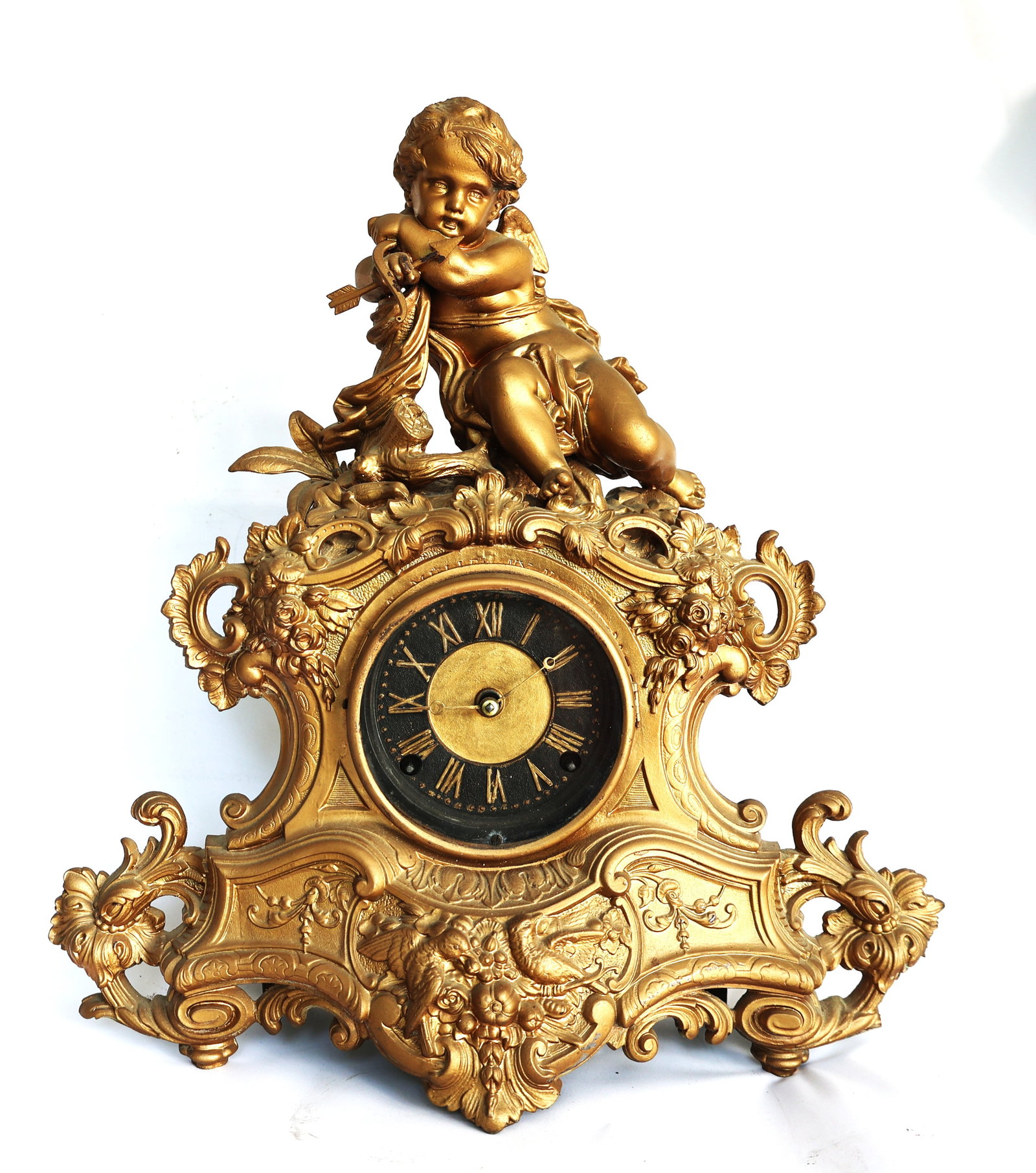 19th-century French mantel clock designed in the ornate Louis XV Rococo style.The case is typically (1 of 9)