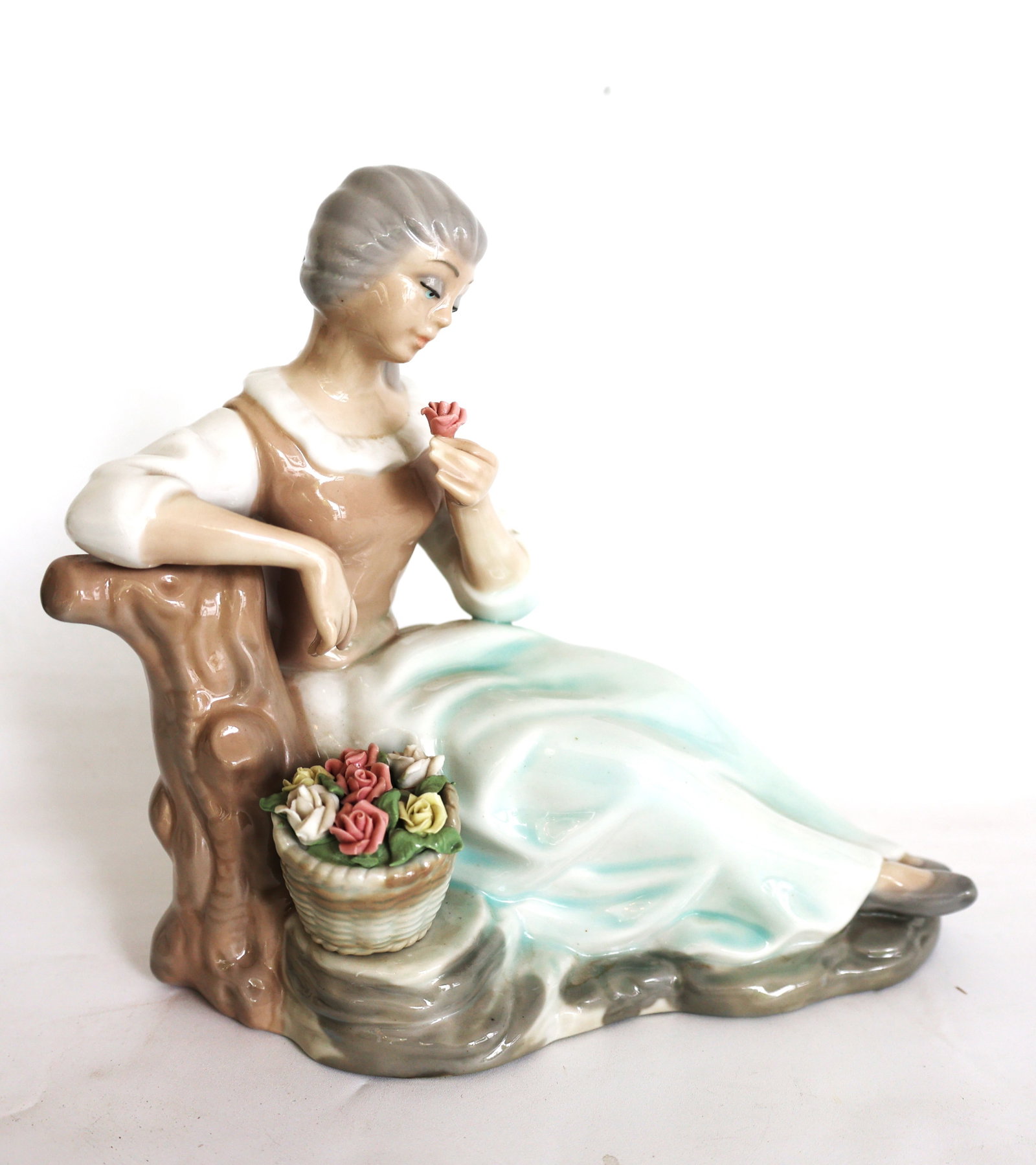 Tengra porcelain figurine features a woman with a flower basket (1 of 5)