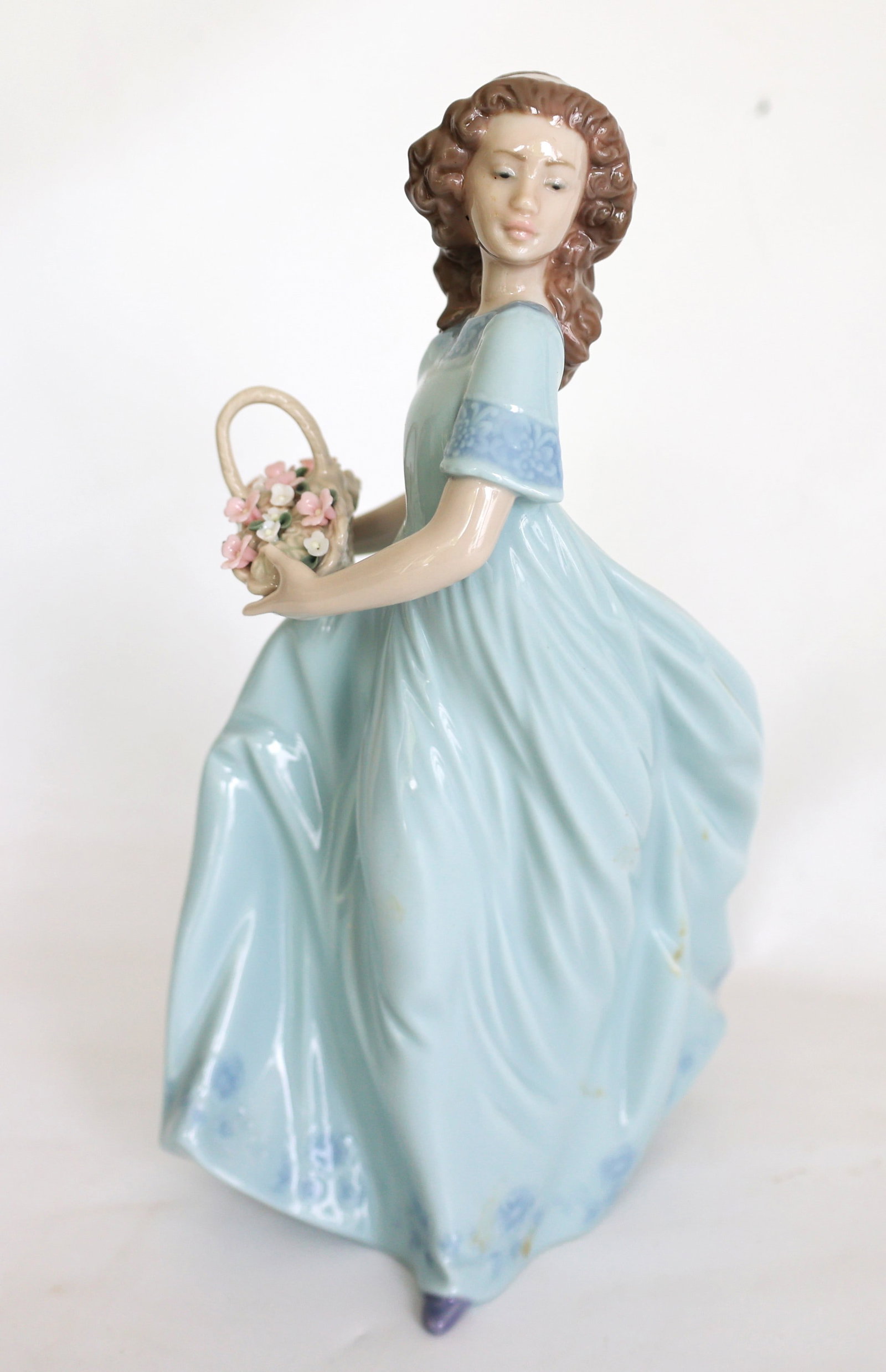 Lladró "Spring Enchantment" porcelain figurine, featuring a young woman in a baby-blue dress (1 of 6)