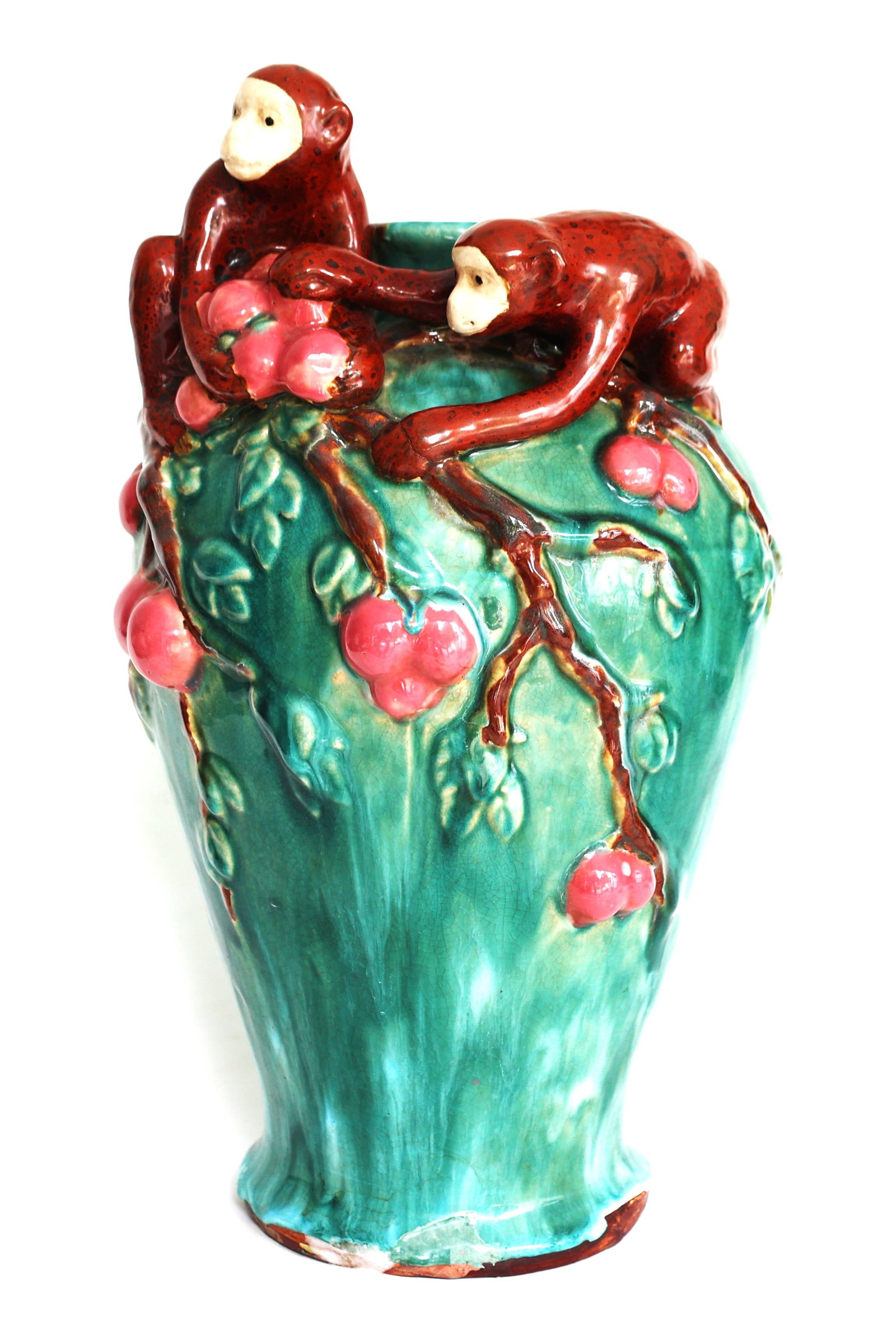 vintage Majolica vase features two applied monkeys feeding on plums against a green glazed backgroun: Size: 15 1/2 in. height,9 in. wide ; vintage Majolica vase features two applied monkeys feeding on plums against a green glazed background