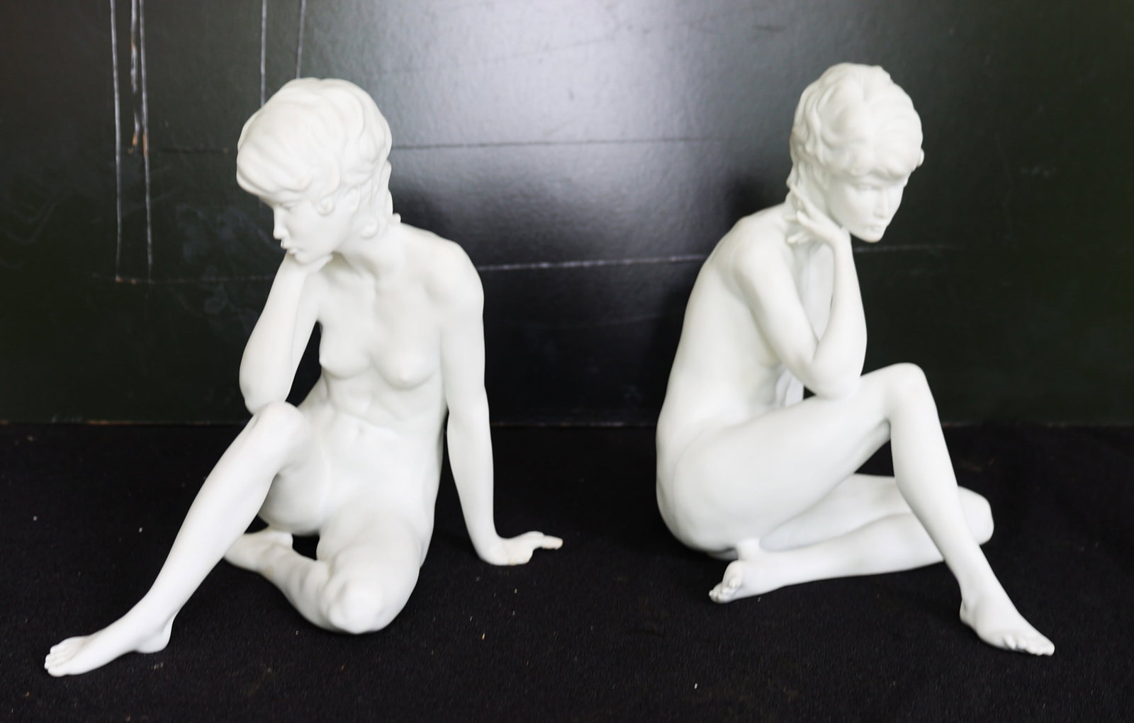 Two white bisque porcelain sculptures are from the Kaiser Nudes collection: Size: 9 in. height x 9 in. wide ; 2 white bisque porcelain sculptures are from the Kaiser Nudes collection, specifically featuring figures like "Meditation" by Wolfgang Gawantka. One has repair to