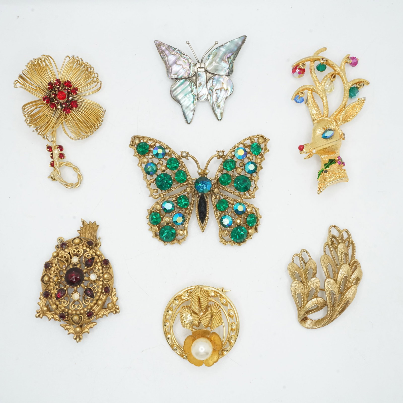 7 Quality Assorted Costume Jewelry Fashion Pins: Weiss Rhinestone Butterfly 2 3/4 in. x 2 1/4 in.;: 7 Quality Assorted Costume Jewelry Fashion Pins: Weiss Rhinestone Butterfly 2 3/4 in. x 2 1/4 in.; Unsigned Faux Gold Tone Pin 1 1/2 in. dia.; Weiss Gold Tone Flower with Red Stones 1 3/4 in. x 2 1/2 
