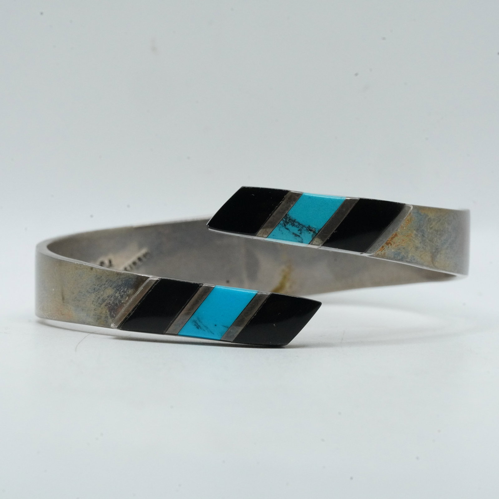 53.79 Grams .925 Sterling Silver with Black Onyx and Turquoise Cuff Bracelet, Mexico TJ-11 925: 53.79 Grams .925 Sterling Silver with Black Onyx and Turquoise Cuff Bracelet, Mexico TJ-11 925, 2 3/4 in. x 2 1/4 in. x 1 1/8 in.