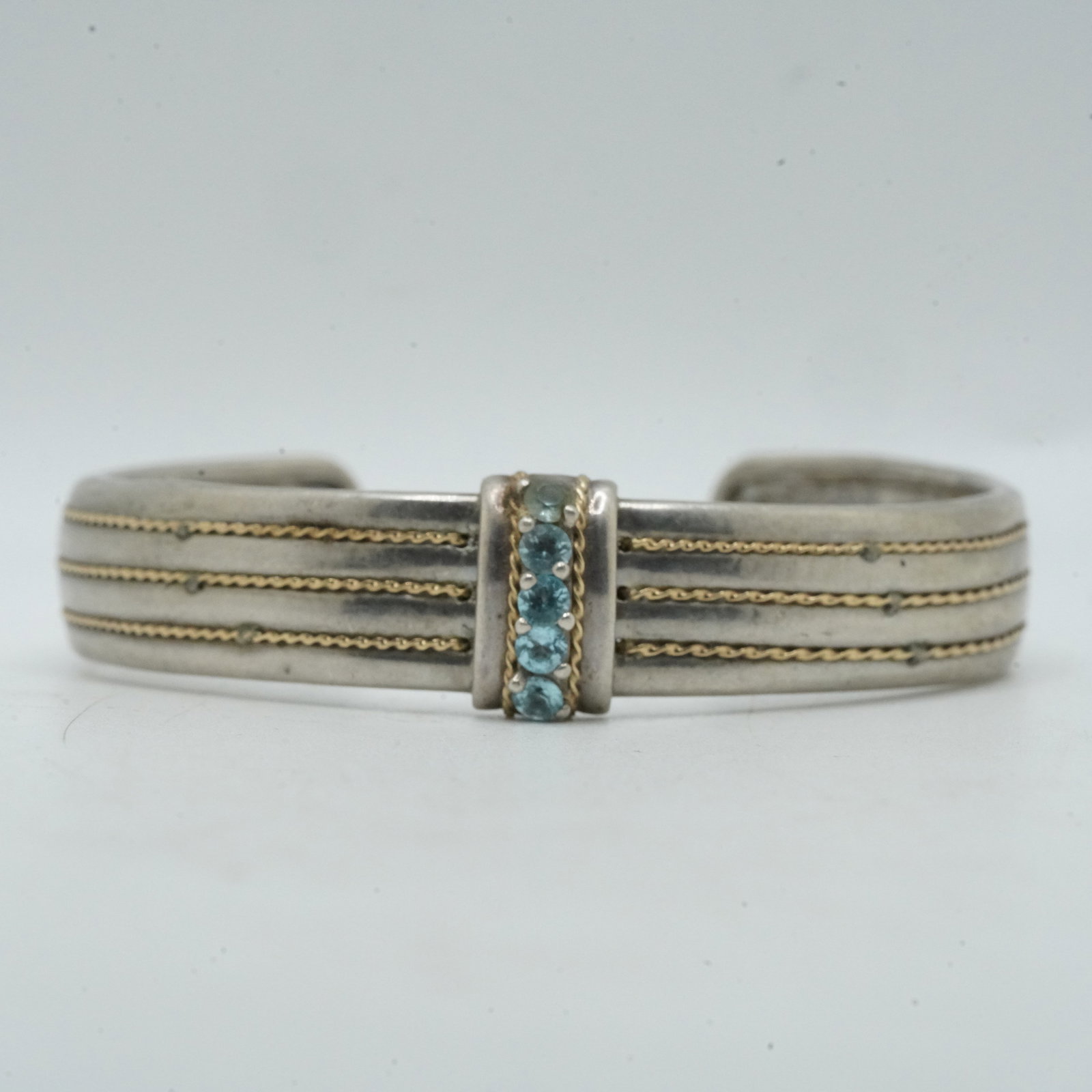 28.40 Grams .925 Sterling Silver and 14K Gold Cuff Bracelet with Blue Topaz - Nice Quality -: 28.40 Grams .925 Sterling Silver and 14K Gold Cuff Bracelet with Blue Topaz - Nice Quality - 2 1/2 in. x 2 1/4 in. x 1/2 in.
