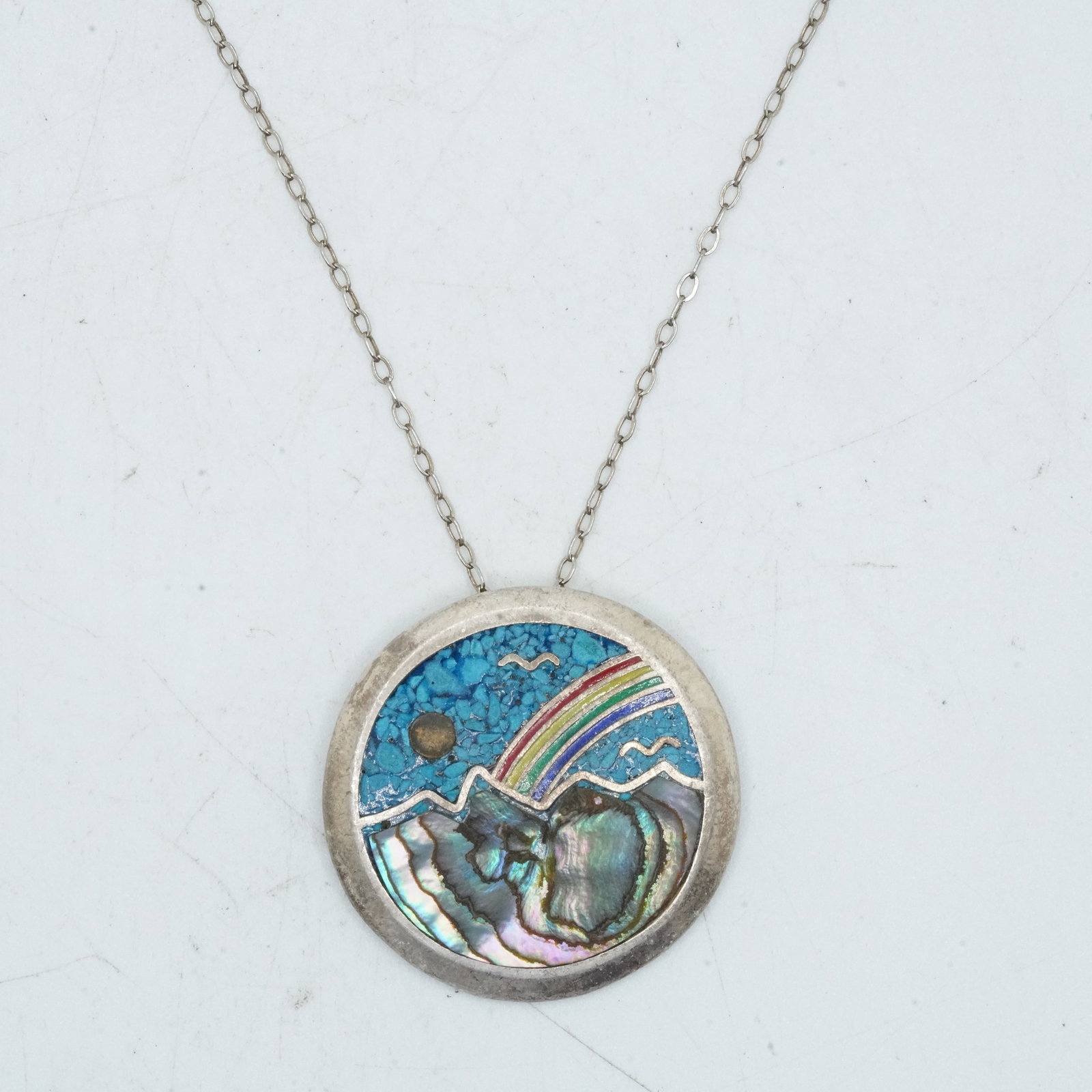 7.14 Grams .925 Sterling Silver Rainbow Pendant Necklace on .925 Sterling 20 in. Chain: 7.14 Grams .925 Sterling Silver Rainbow Pendant Necklace on .925 Sterling 20 in. Chain. Pendant Size: 1 in. dia.