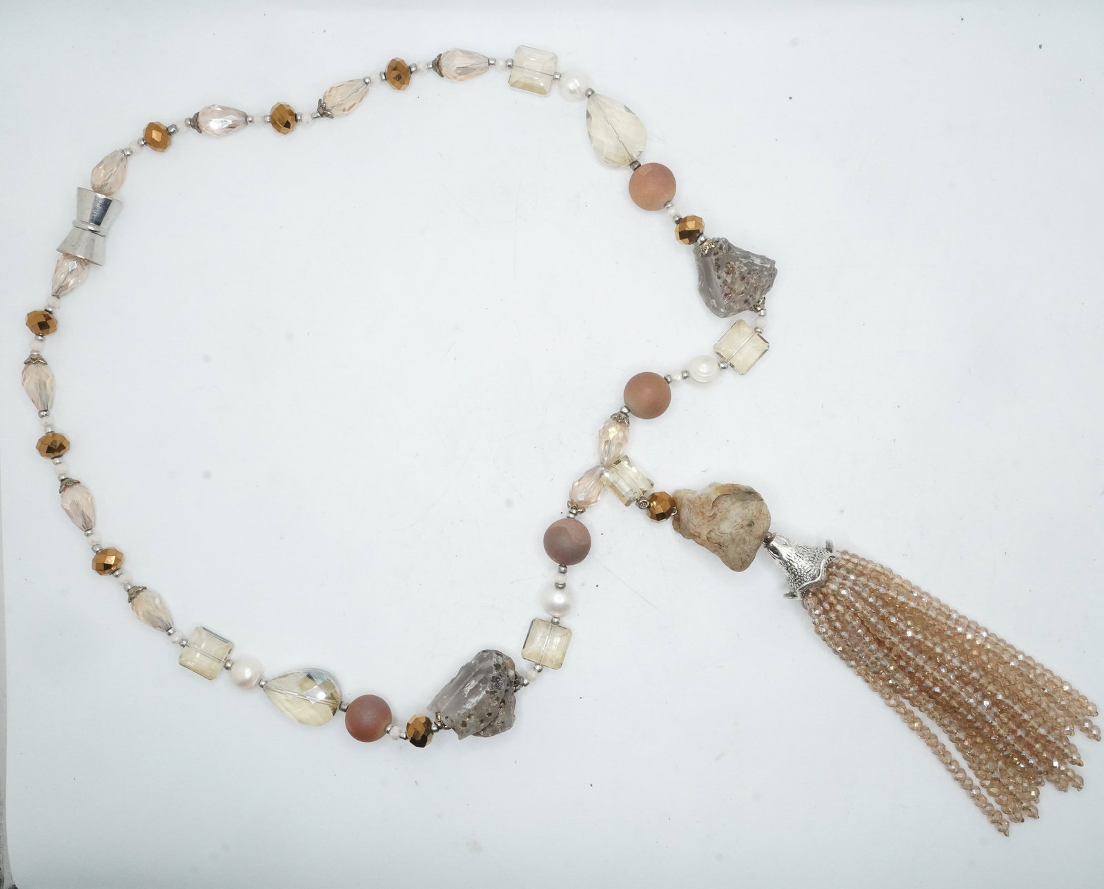 Exquisite Iridescent Glass Faceted Beads Large Tear, Small Tear and Square Shape Beads: Exquisite Iridescent Glass Faceted Beads Large Tear, Small Tear and Square Shape Beads with Champagne Spacer Beads and Large Geode Beads Necklace, has a Tassel made of 14 Strings of Champagne Iridesce