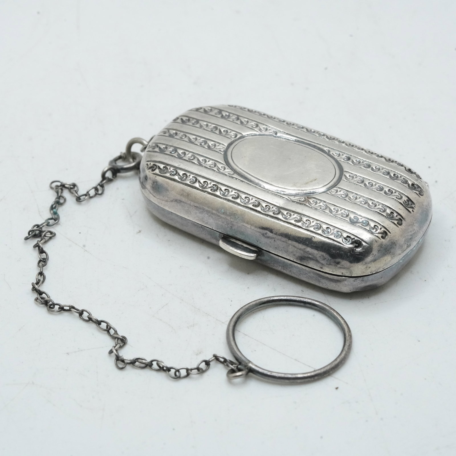 31.96 Grams Sterling Silver Victorian Coin Case with 6 inch Pocket Chain: 31.96 Grams Sterling Silver Victorian Coin Case with 6 inch Pocket Chain. Size case 1 1/4 in. x 2 1/4 in.
