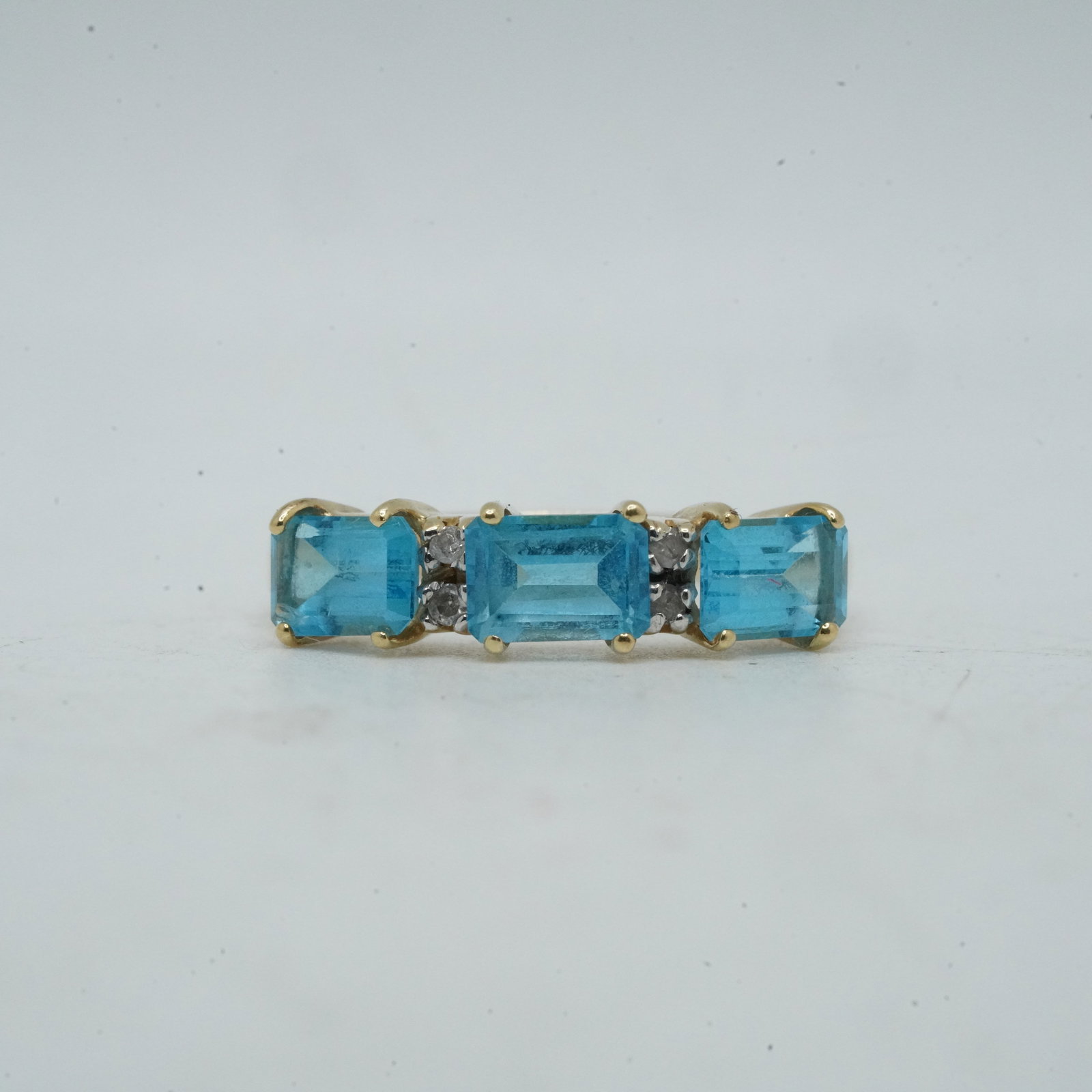 2.76 Grams .925 Sterling Silver 3 Blue Topaz and 2 Diamonds Ring Size 7.5, 3/4 in. x 1/4 in.: 2.76 Grams .925 Sterling Silver 3 Blue Topaz and 2 Diamonds Ring Size 7.5, 3/4 in. x 1/4 in.