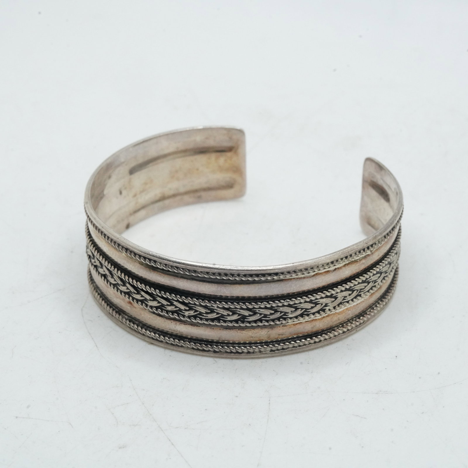 24.09 Grams .925 Sterling Silver BA Native American Rope Twist Cuff Bracelet: 24.09 Grams .925 Sterling Silver BA Native American Rope Twist Cuff Bracelet. 2 3/8 in. x 2 1/4 in. x 3/4 in.