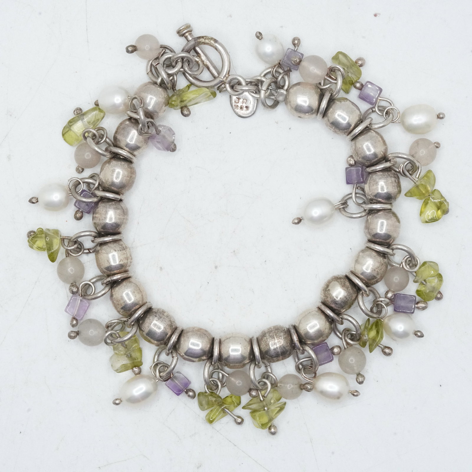 .925 Sterling Silver 48 Grams Bead Bracelet with Rose Quartz, Peridot and Freshwater Pearls: .925 Sterling Silver 48 Grams Bead Bracelet with Rose Quartz, Peridot and Freshwater Pearls. 8 in. x 1 1/4 in.