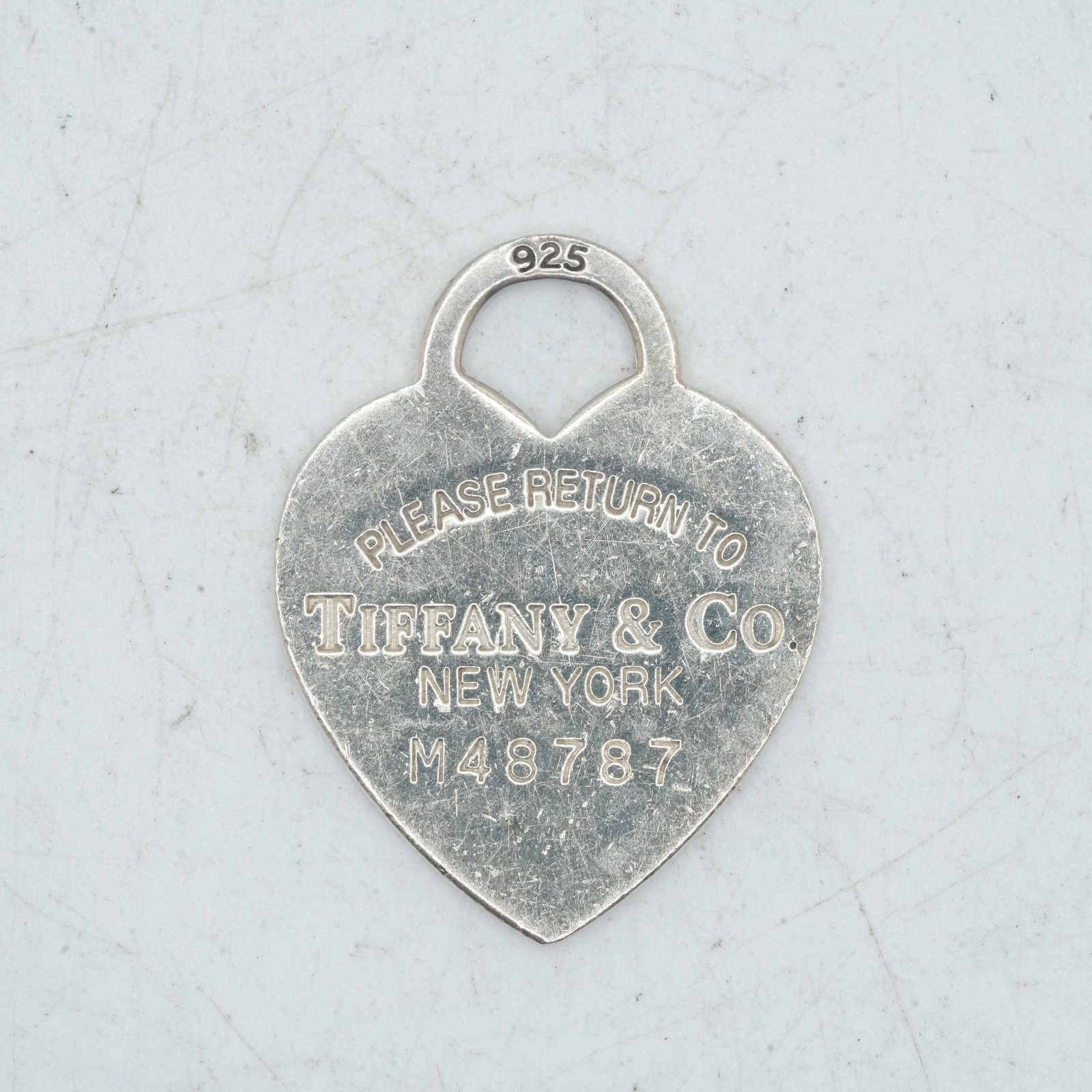7.46 Grams .925 Sterling Silver TIFFANY & CO Heart Pendant :please Return To Tiffany & Co": 7.46 Grams .925 Sterling Silver TIFFANY & CO Heart Pendant :please Return To Tiffany & Co" ; 1 in.x 1 1/4 in.