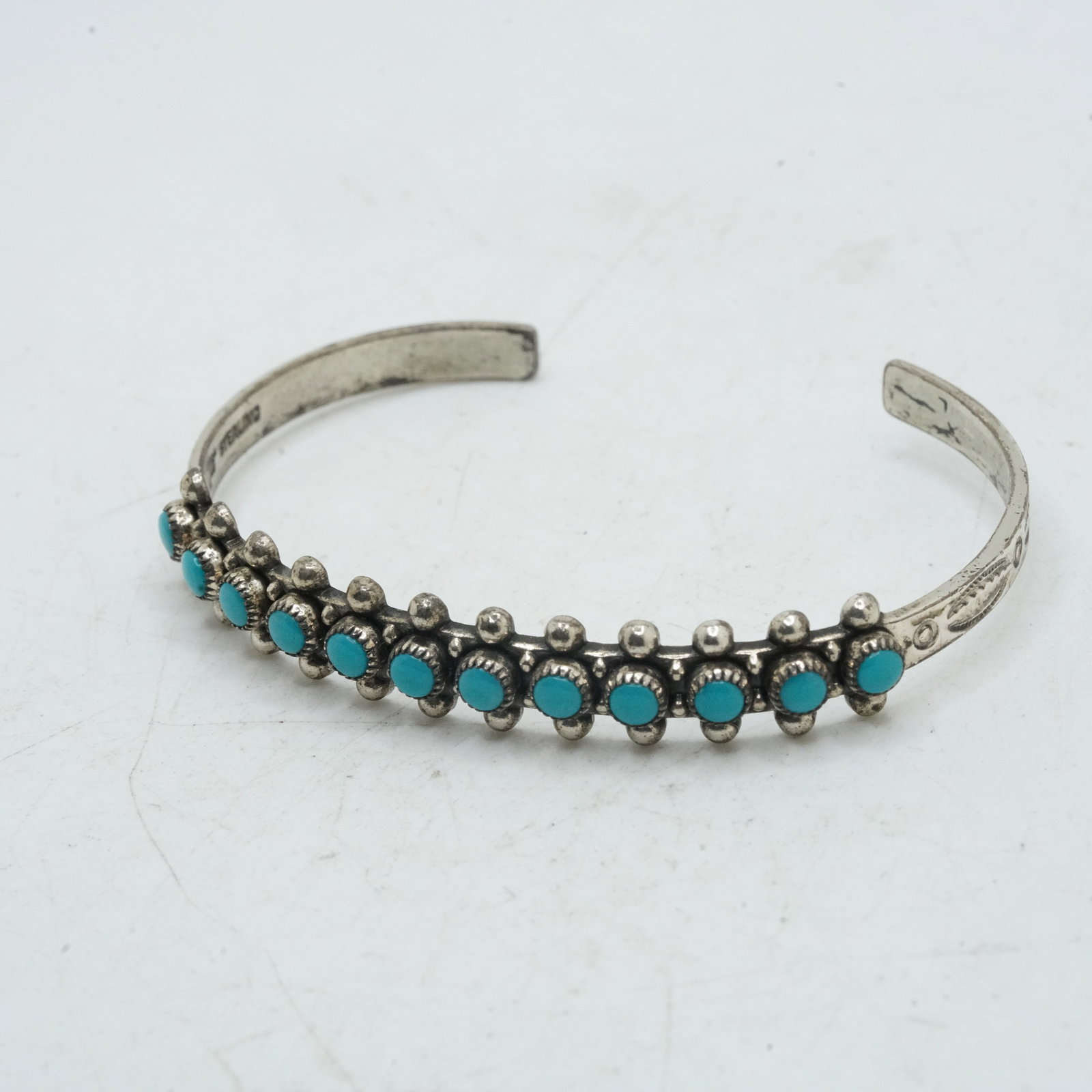 13.31 Grams Sterling Silver Native American Indian Navajo Turquoise Cuff Bracelet Fox Sign Symbol: 13.31 Grams Sterling Silver Native American Indian Navajo Turquoise Cuff Bracelet Fox Sign Symbol ; 2c1/2 in. x 2 in. x 3/8 in.