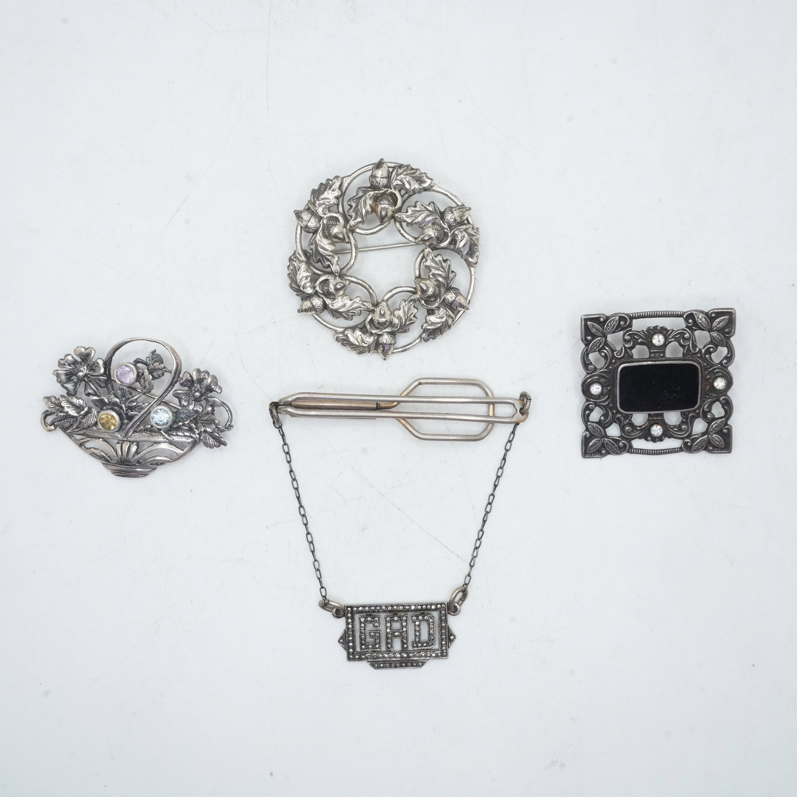 36.23 Grams [3] Sterling Silver Pins and [1] Tie Clip: Sterling Basket with Blue Topaz, Citrine and: 36.23 Grams [3] Sterling Silver Pins and [1] Tie Clip: Sterling Basket with Blue Topaz, Citrine and Amethyst 1 7/8 in. x 1 1/4 in. ; Danecraft Sterling Acorn Wreath Pin 1 3/4 in. ; .925 Blacl Onyx Squ