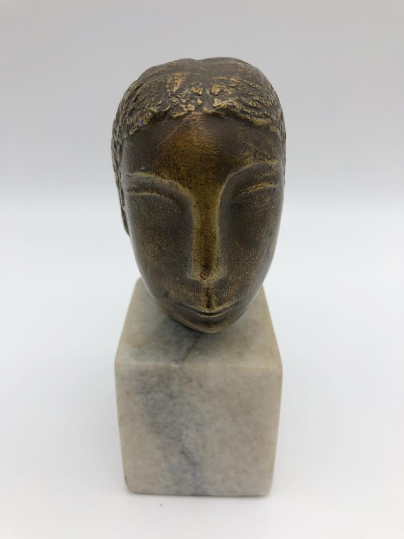 William Zorach (1889-1966) "Head": 6.25" ht. On a marble base. This sculpture was purchased directly from William Zorach by the current owner's mother, Lillian Lamden, a well respected sculptor. Lamden visited Zorach in his Massachuset