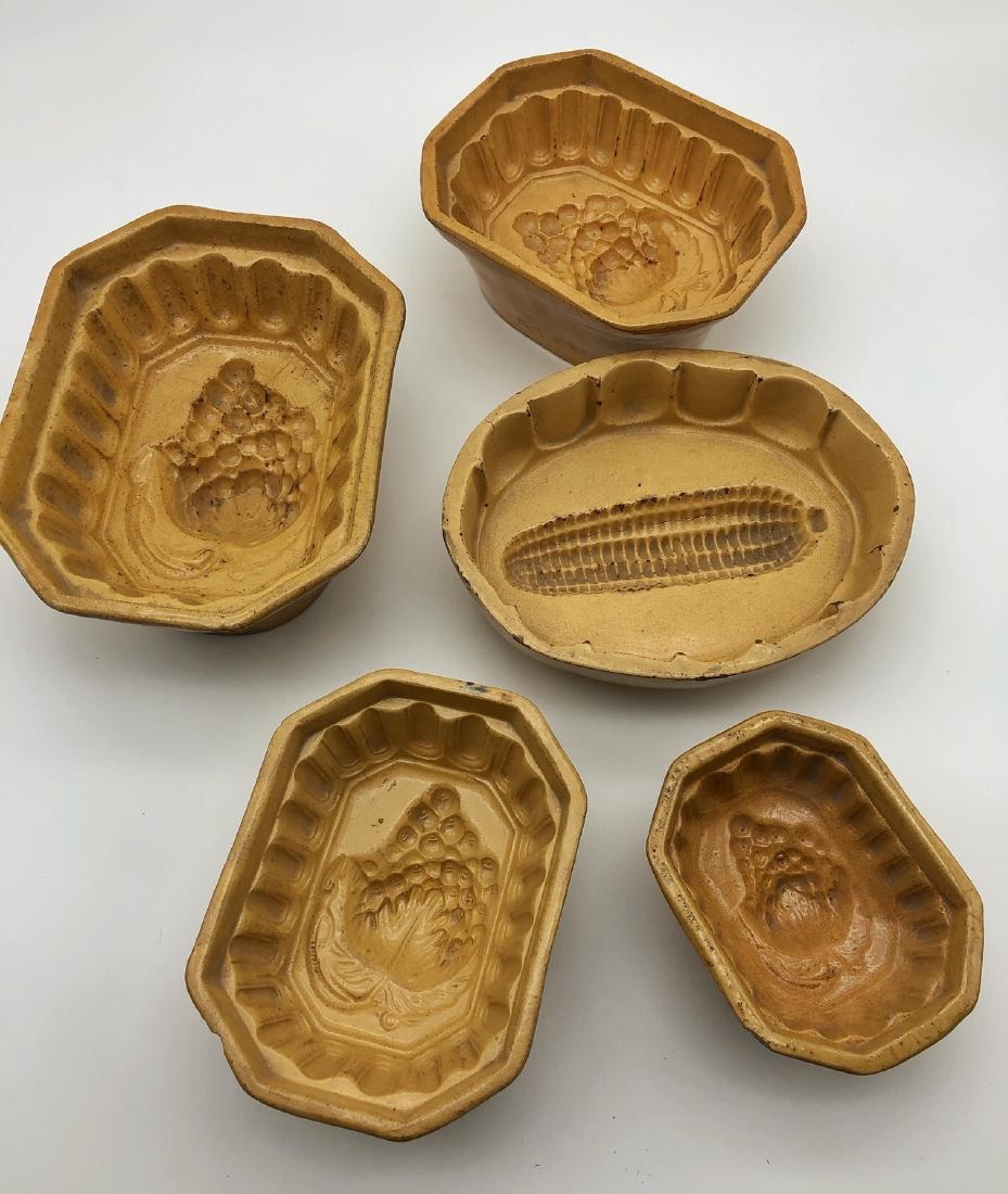 Collection of 19 Yelloware Bowls and Vessels: 5" ht. tallest