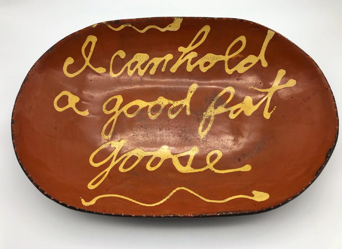 Contemporary Redware (5 pieces): Largest: 19.5" long, "I can hold a big fat goose" inscribed on the front. 1999, Turtle Creek Pottery stamp on verso, Morrow, Ohio, "Christopher Works" and "Dont tread on me" on verso.