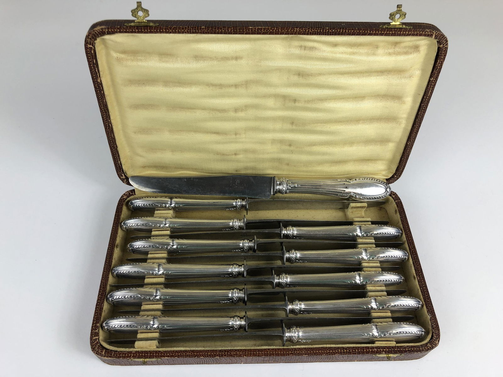 Boxed Silver Knife Set: Includes 12 knives in fitted box. Box measures 11" wide by 6.25" deep.