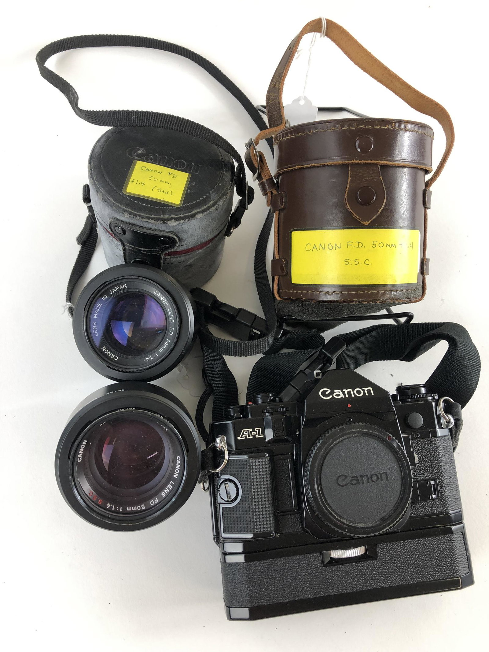 Canon A1 Camera with two 50mm 1:1.4 Lenses in cases: Canon A1 Camera with two 50mm 1:1.4 Lenses in cases