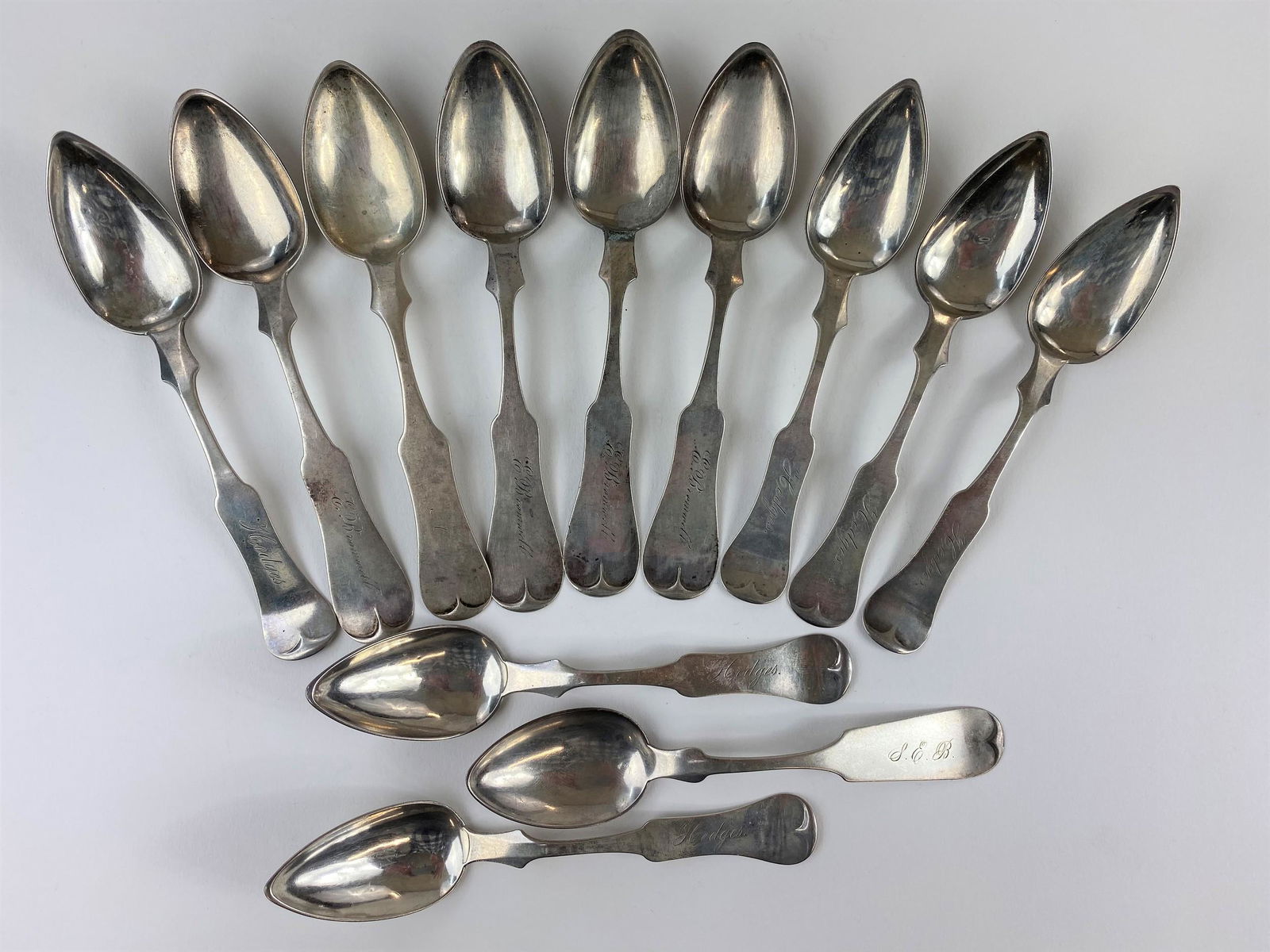 Duhme & Co. (Cincinnati, Ohio) Coin Silver Spoons: A set of 12 Duhme spoons; 7.26 ozt.