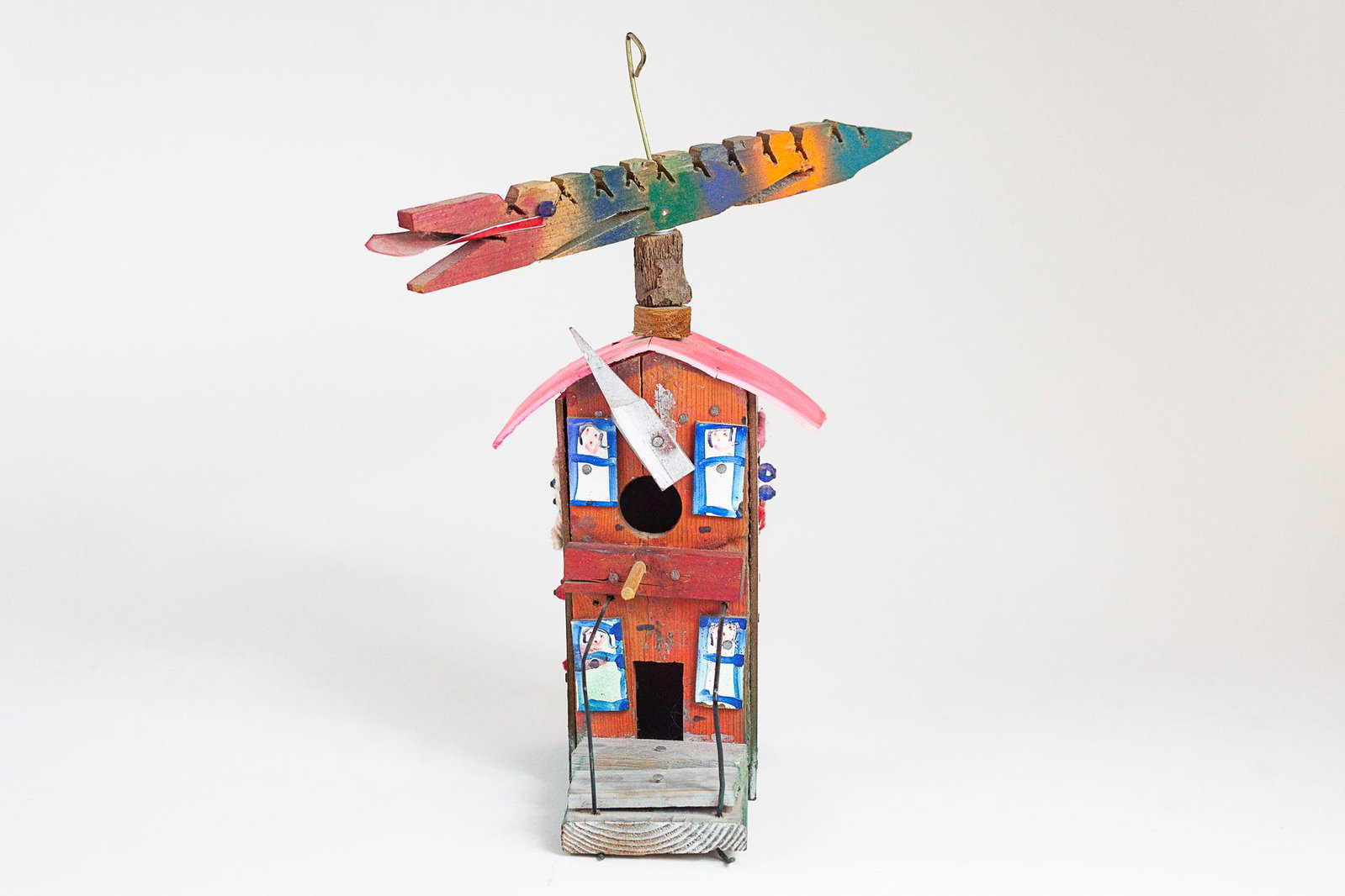 Pair of Appalachian Folk Art Sculptures: Two folk art sculpures, incluing a gourd and house with weathervane; ht of one 21", ht. of other 15.5".
