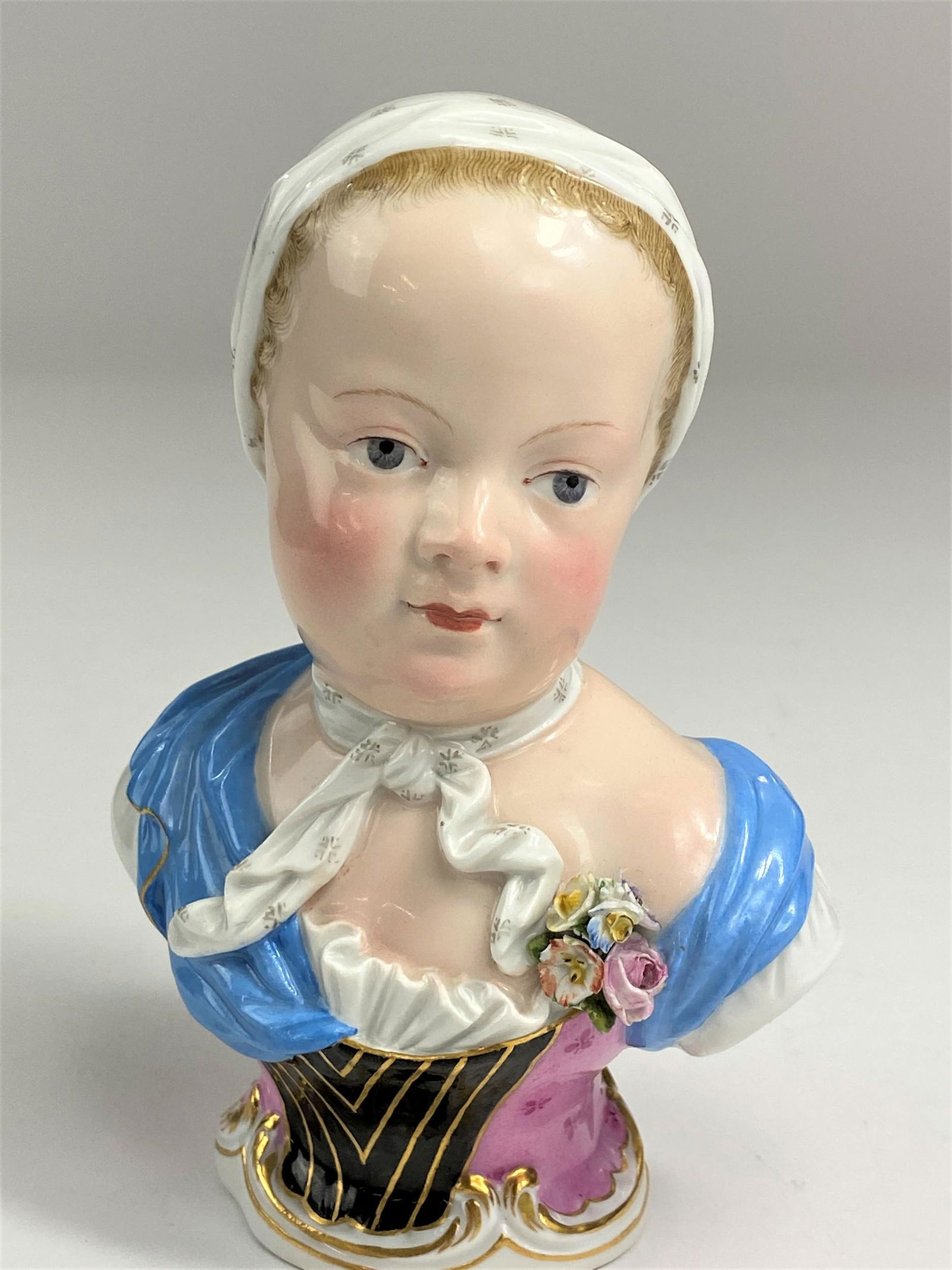 A Meissen Decorated Porcelain Bust of Marie De Bourbon,: Second half of the 18th century, from a model by Johann Joachim Kandler (1706-1775), depicting the Pincess Marie-Zephyrine de Bourbon (1750-1755). With crossed sword mark to underside, as well as stam