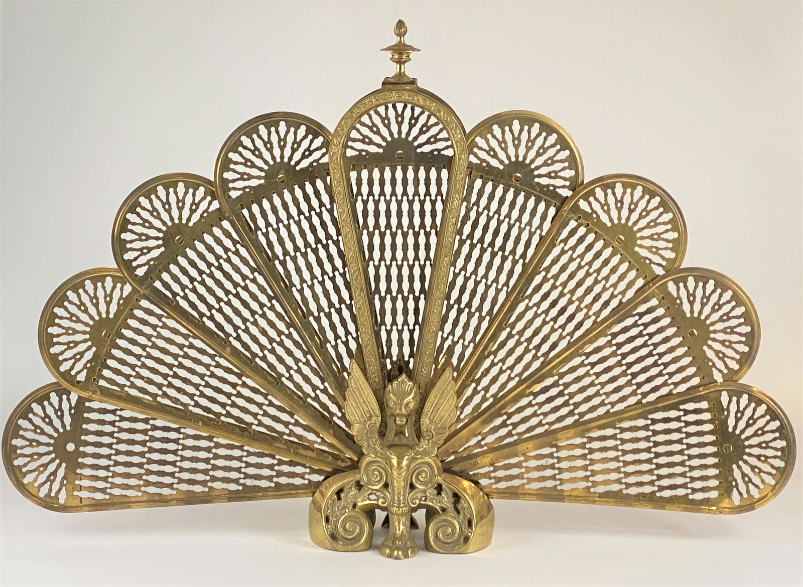 An Ornately Hammered Brass Fireplace Screen (1 of 5)