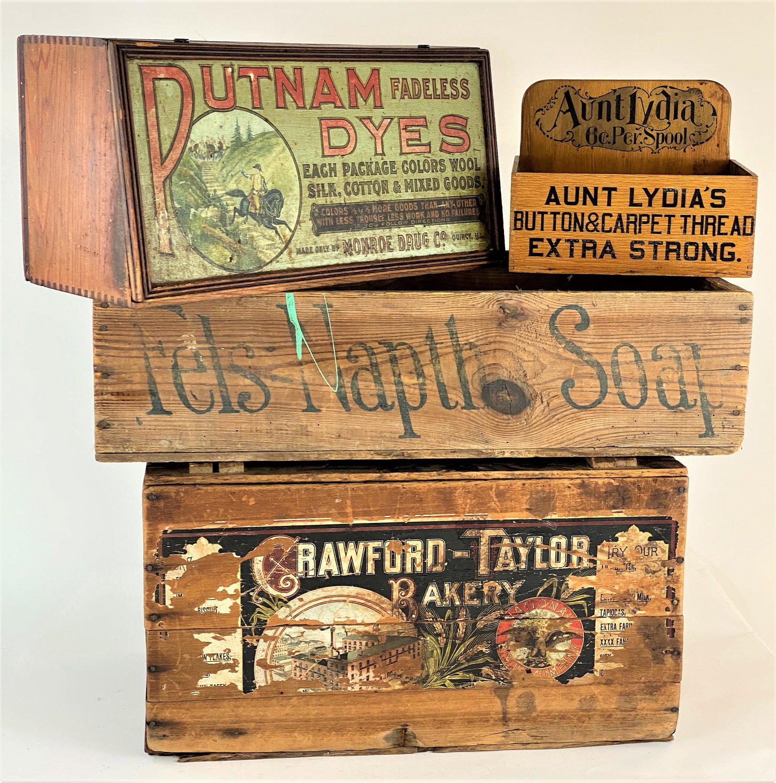 Putnam Dyes Box, and Other Advertisement Crates: Group of 4, including a Putnam Dyes box, Aunt Lydia spool store display box, and a pair of crates from Fels Naptha Soap and a Crawford-Taylor baker's box, Mansfield, OH; largest ht. 13".